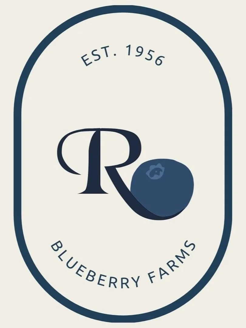 Logo for Blueberry Farms with a large letter 'R' and a stylized blueberry, EST. 1956, in an oval shape.
