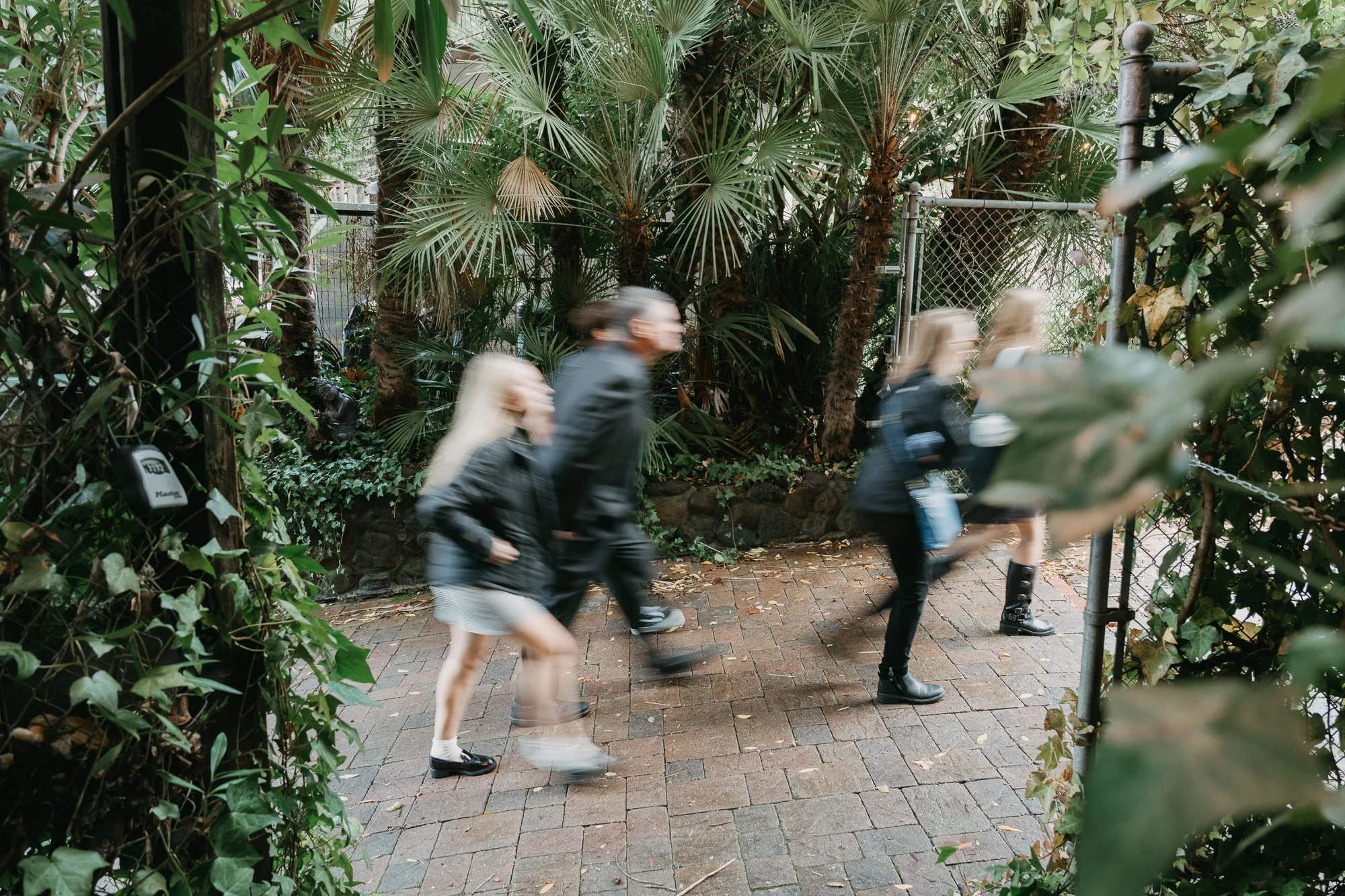 Guests exploring the garden paths during an Open House at Wildwood Acres
