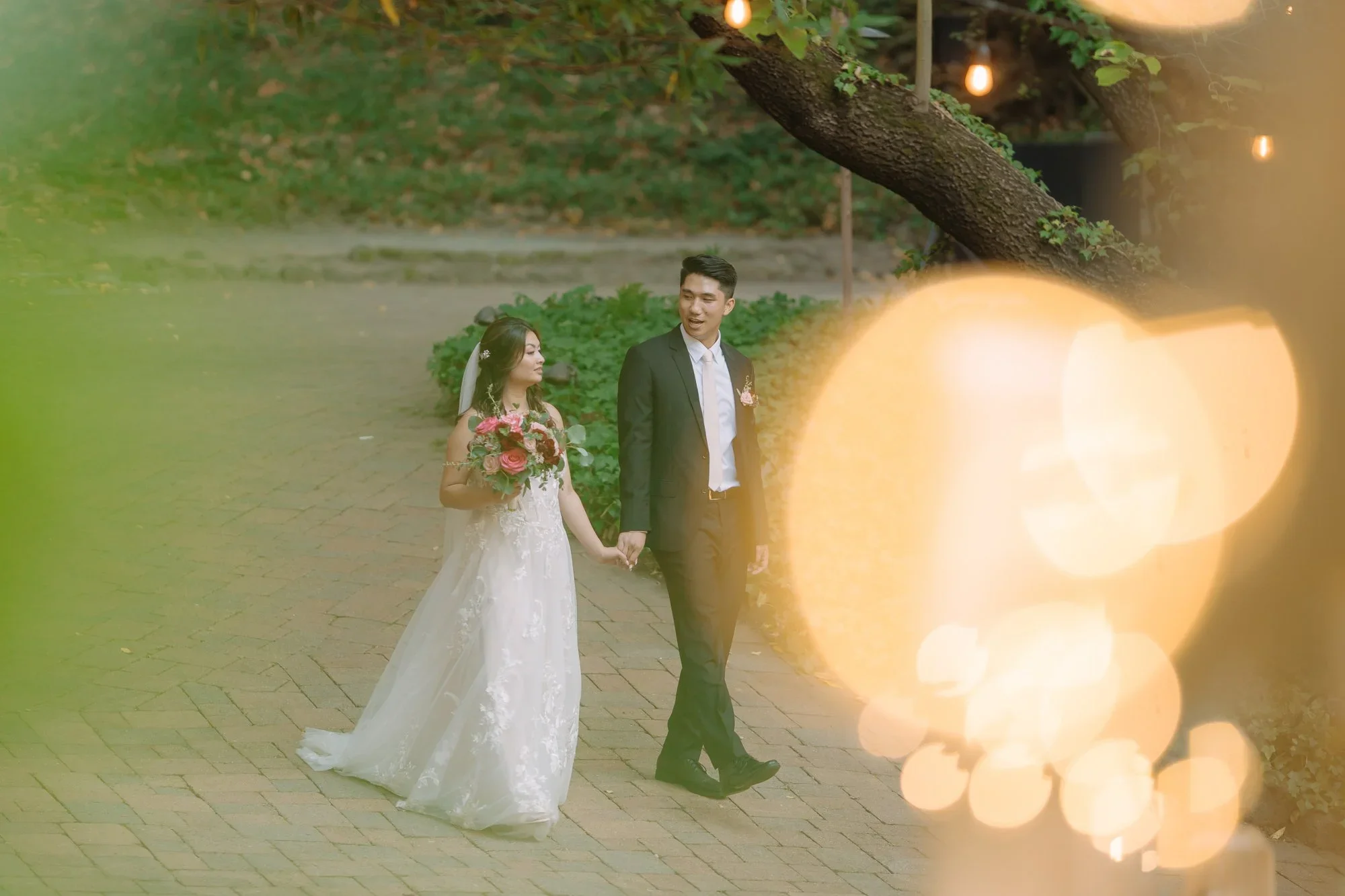 Bride and groom among the trees