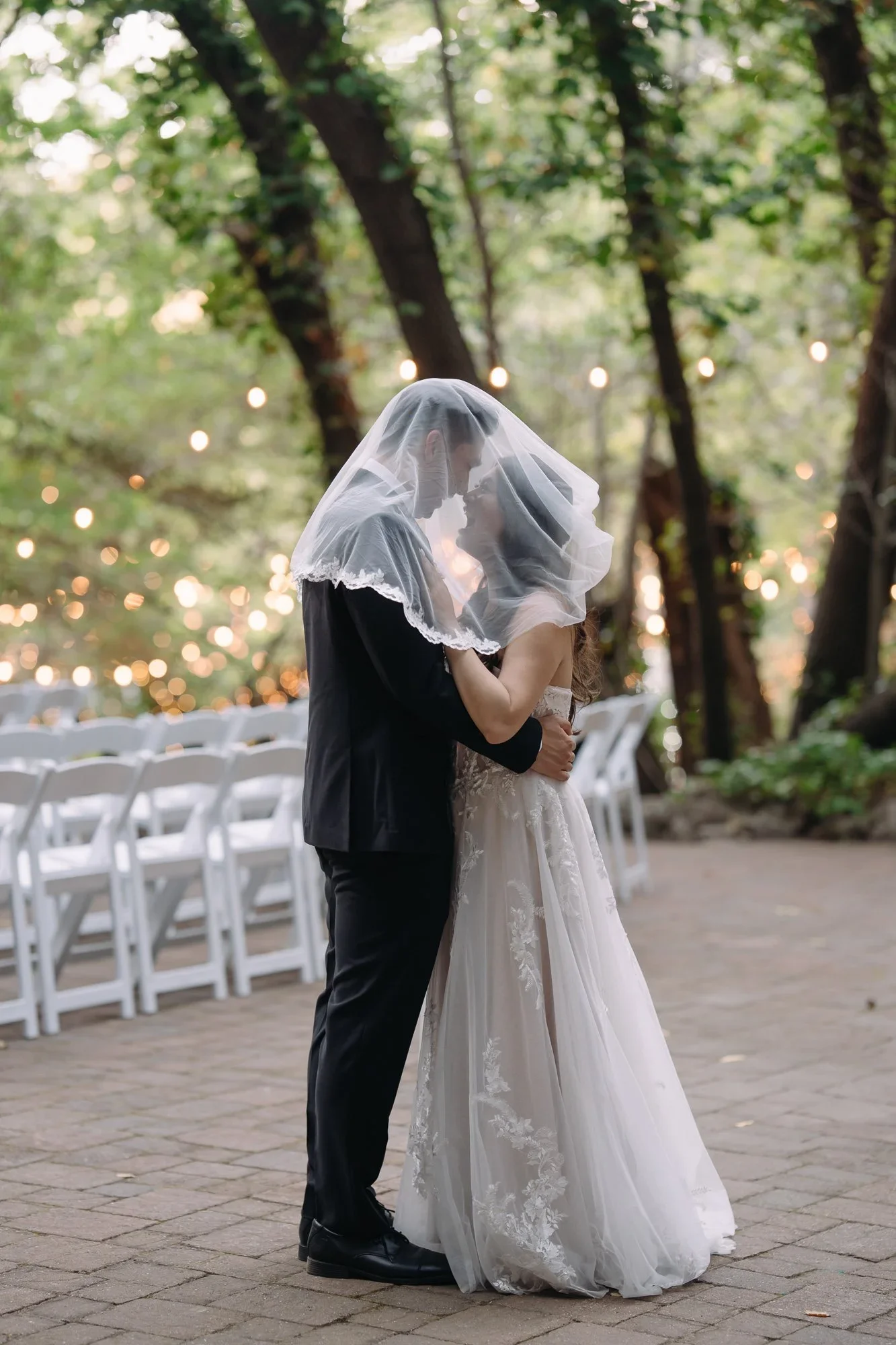 Couple embracing at the ceremony site