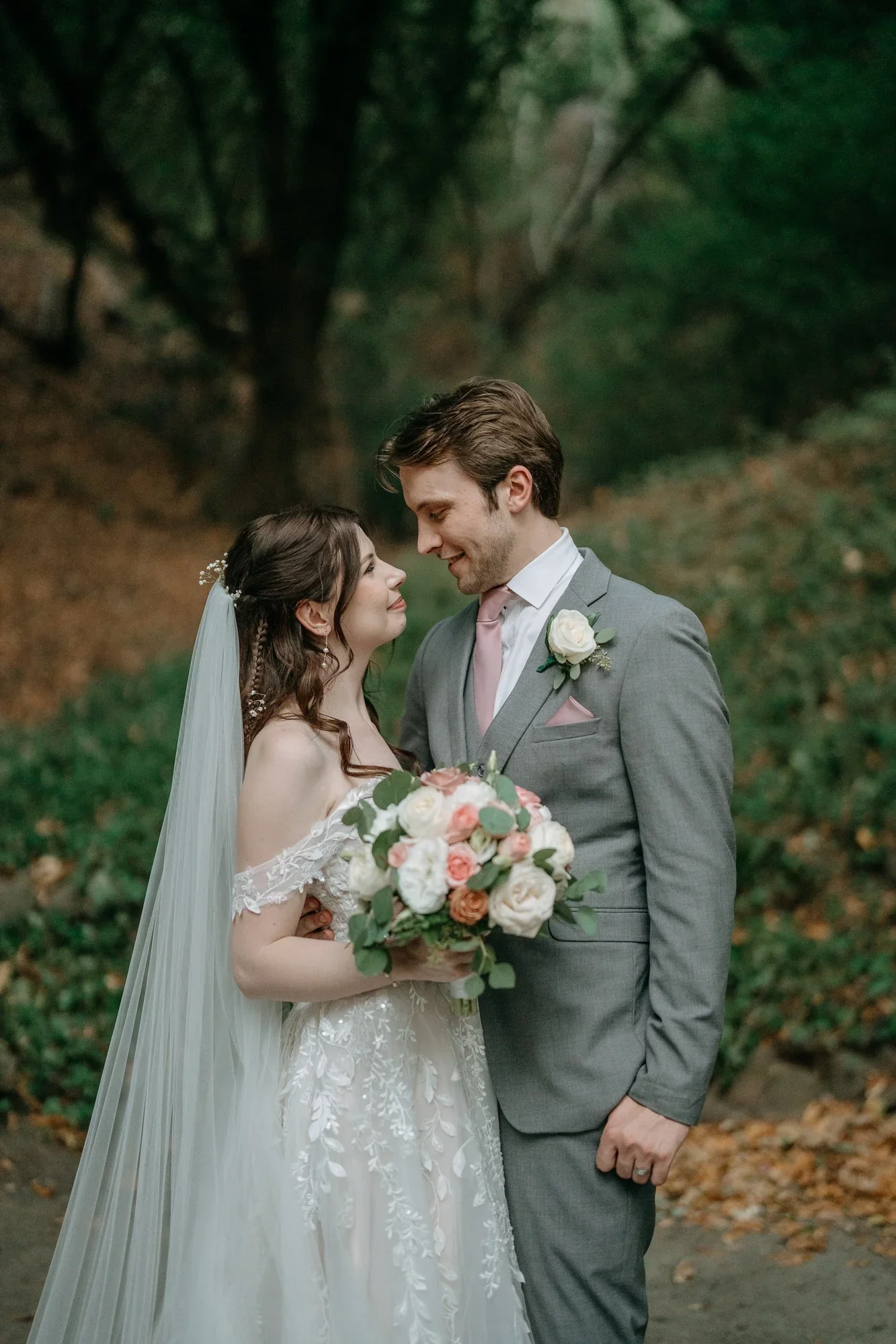 Bride and groom smiling together