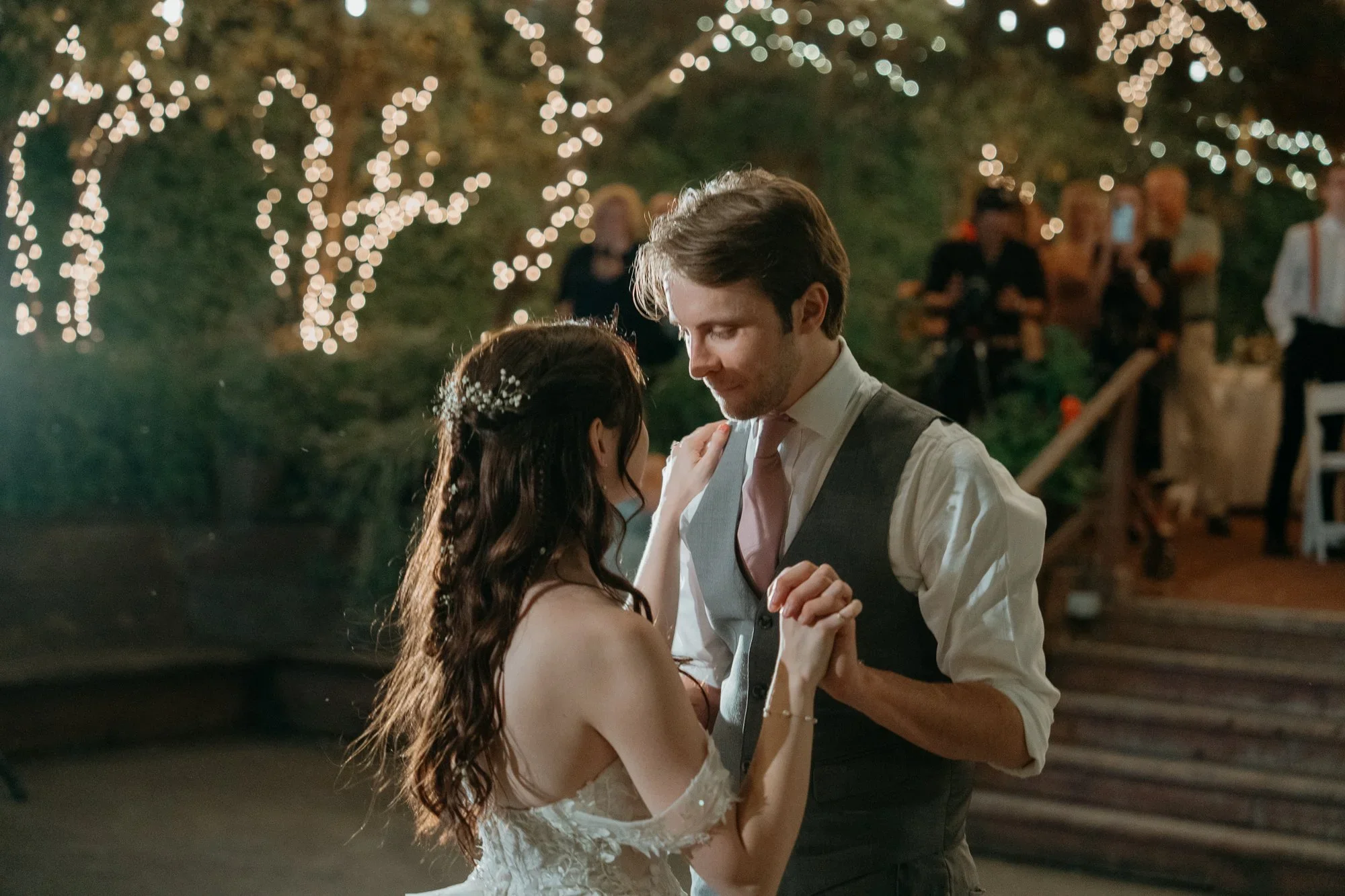 Couple's first dance under the lights