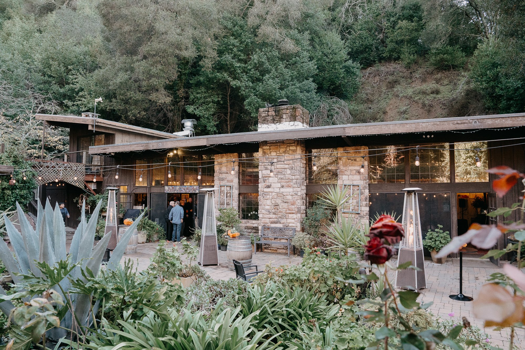 Stone clubhouse and garden patio at Wildwood Acres, Lafayette CA
