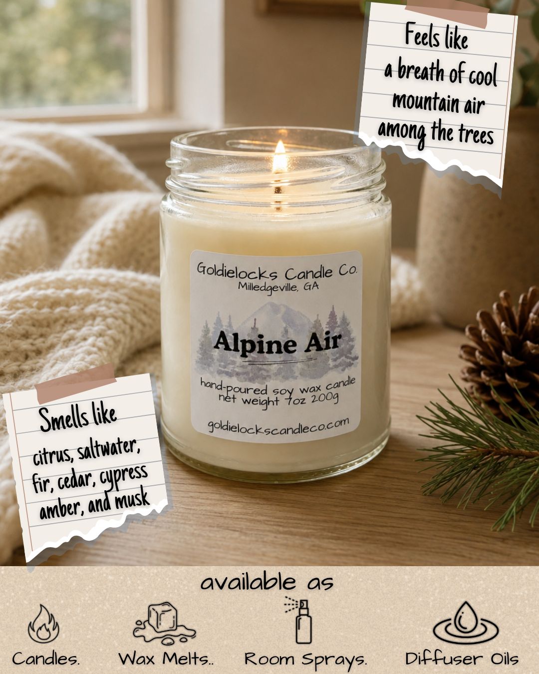 A lit candle labeled 'Alpine Air' by Goldielocks Candle Co., with notes describing its scent as citrus, saltwater, fir, cedar, cypress, amber, and musk. The background includes cozy knitted blankets, pine cones, and pine branches. Text notes suggest it evokes a breath of mountain air among the trees and smells like citrus, saltwater, fir, cedar, cypress, amber, and musk. Icons indicate it is available as candles, wax melts, room sprays, and diffuser oils.