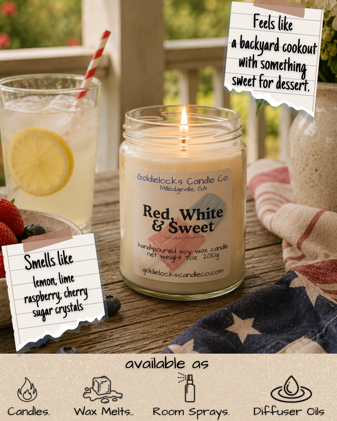 A lit candle from Goldielocks Candle Co. labeled 'Red, White & Sweet', on a wooden table surrounded by strawberries, blueberries, and a glass of lemonade with lemon slices, with notes indicating it smells like lemon, lime, raspberry, cherry sugar crystals, and feels like a backyard cookout with something sweet for dessert. There is a note suggesting the candle is available as candles, wax melts, room sprays, and diffuser oils.
