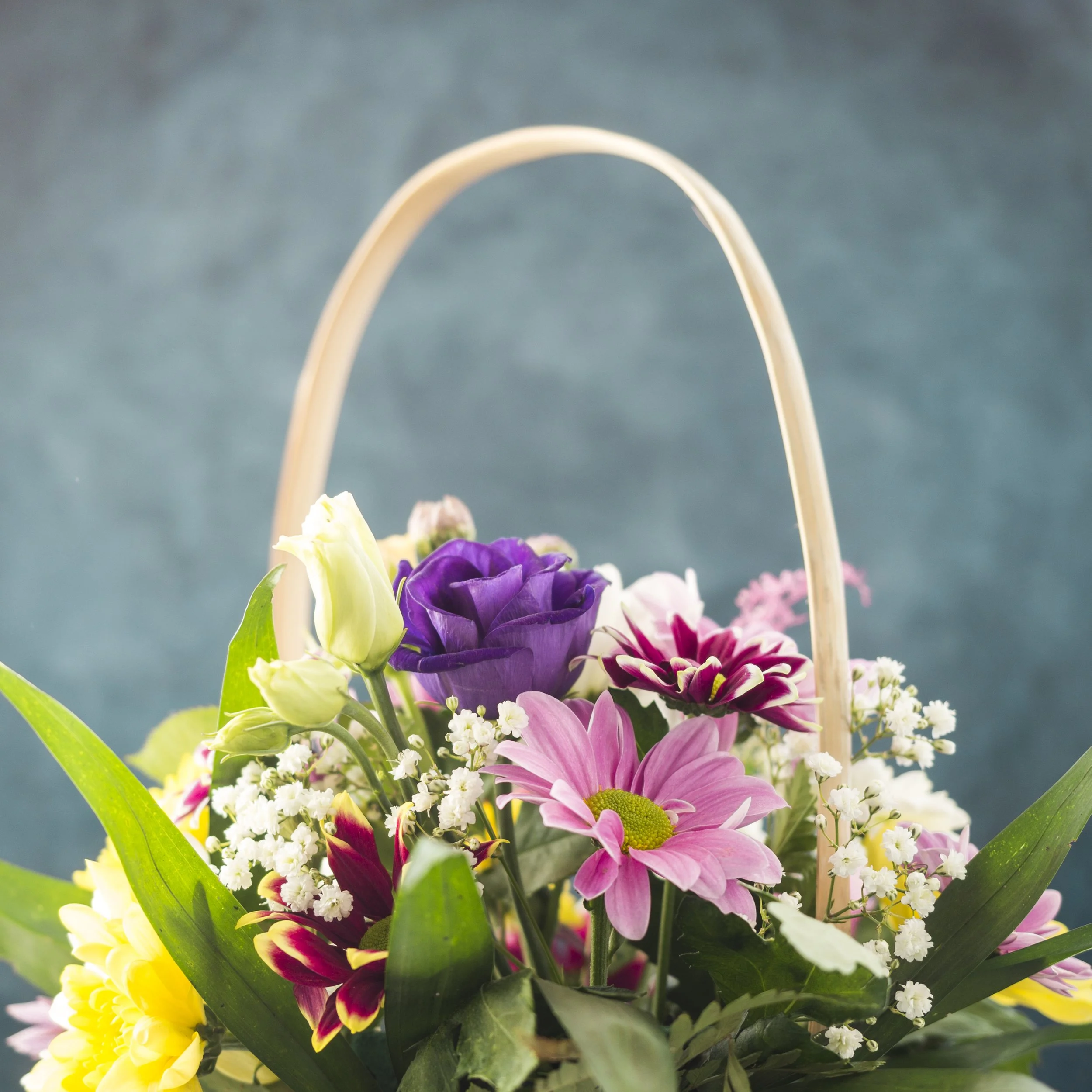 fresh-flowers-bunch-placed-wicker-basket.jpg