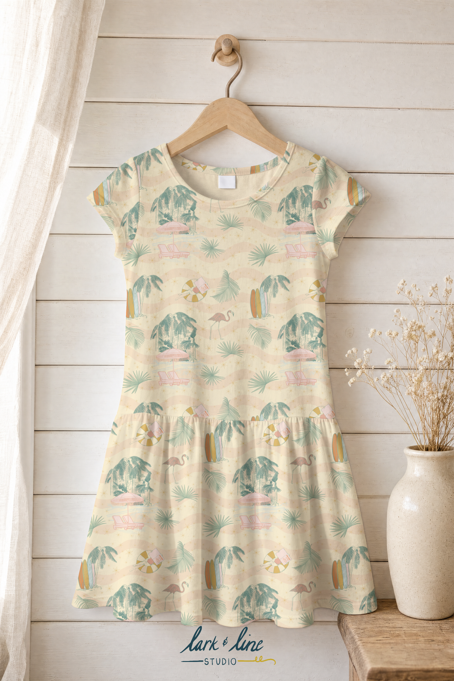 Golden Hour Getaway:  A dreamy tropical scene featuring vintage flamingos, swaying palms, retro umbrellas, surfboards and sun-soaked details. Inspired by nostalgic vacation postcards and faded coastal afternoons, this print captures the magic of a re
