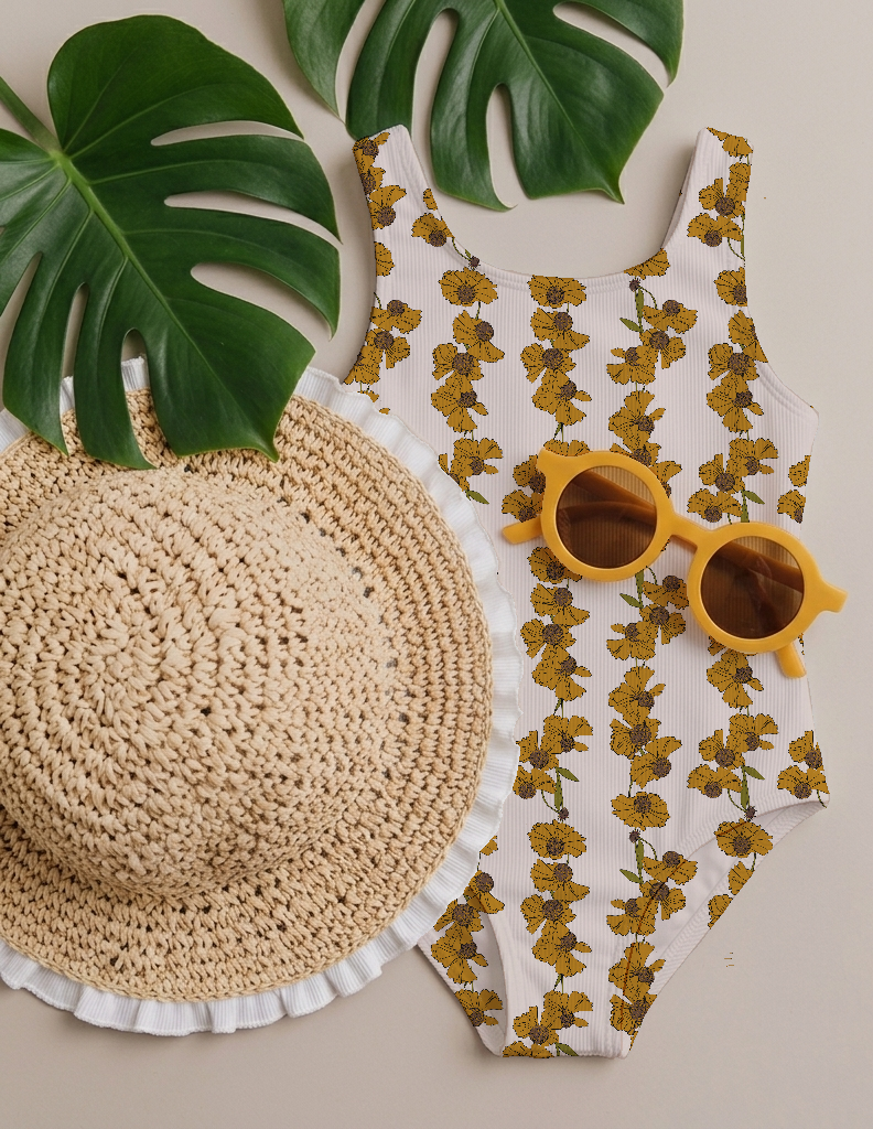 Wildflower Path:  Golden wildflowers bloom in loose vertical clusters, inspired by flowers growing naturally along woodland paths and open meadows visited by young explorers.