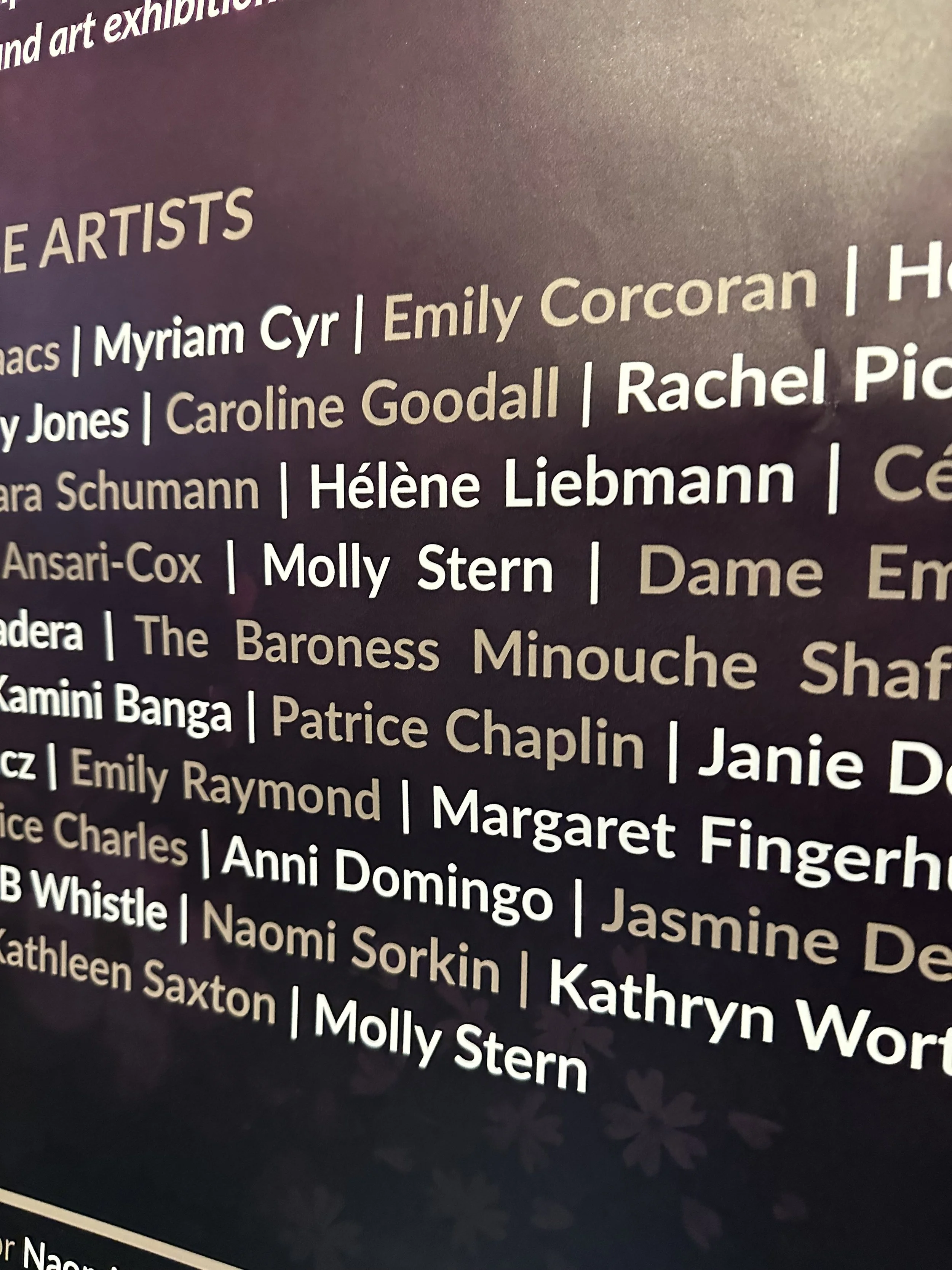 Close-up of a list of names on a poster, with the heading 'art exhibition' and names of artists, including the playwright Molly Stern.