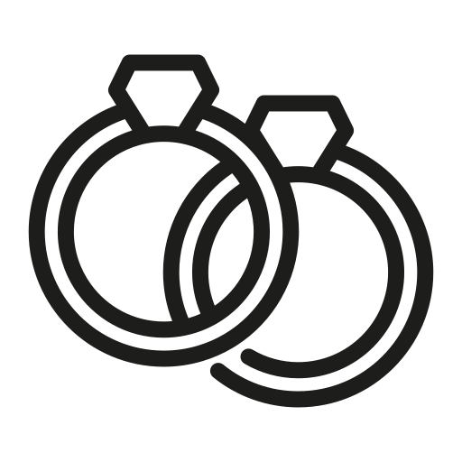 Outline of two wedding rings with gemstones