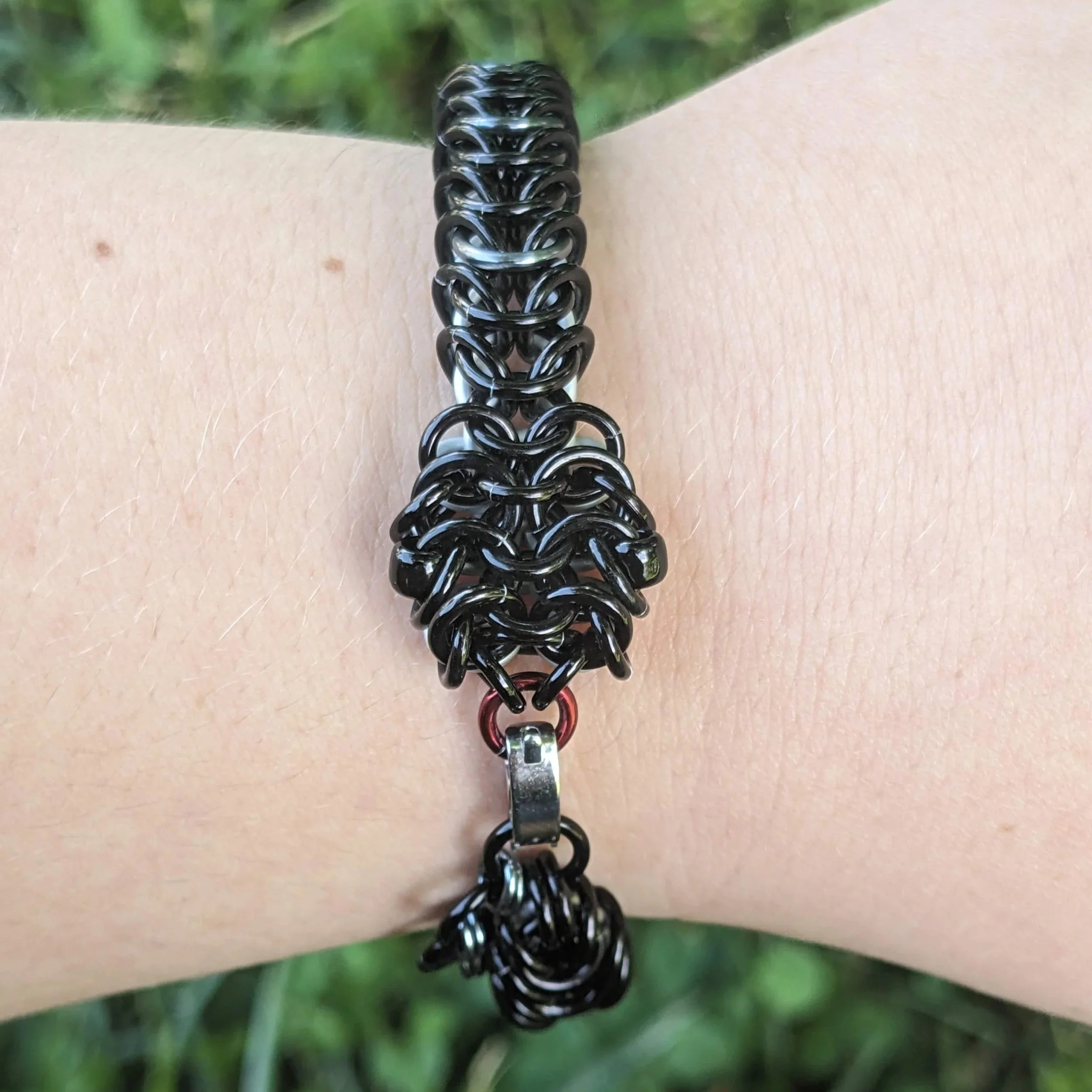 Grey Ratsnake bracelet on wrist