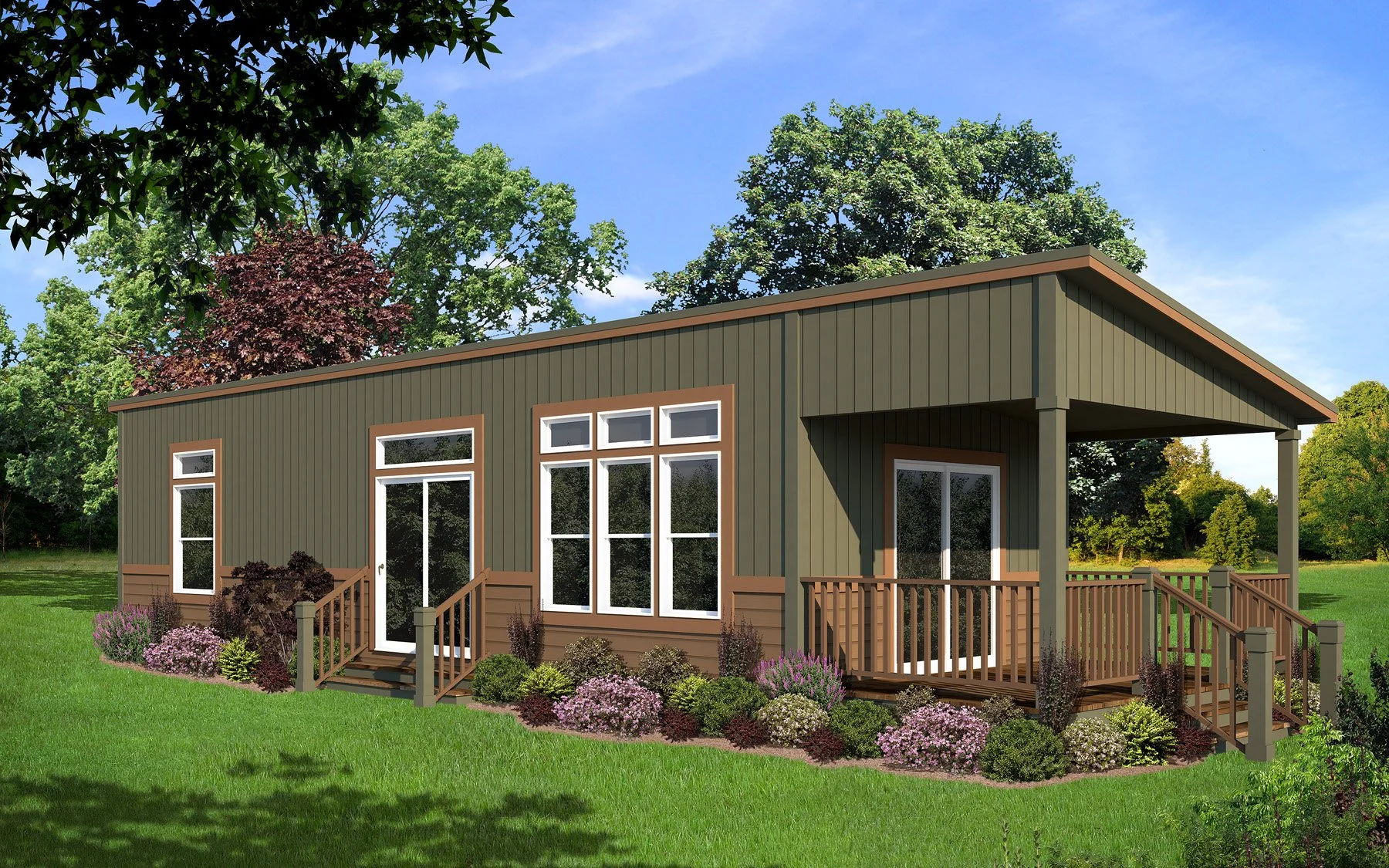A modern, single-story house with olive green vertical siding and large windows, surrounded by a lush green lawn and garden with colorful flowers and bushes. The house features a small deck with stairs and a porch, set under a partly cloudy sky with 