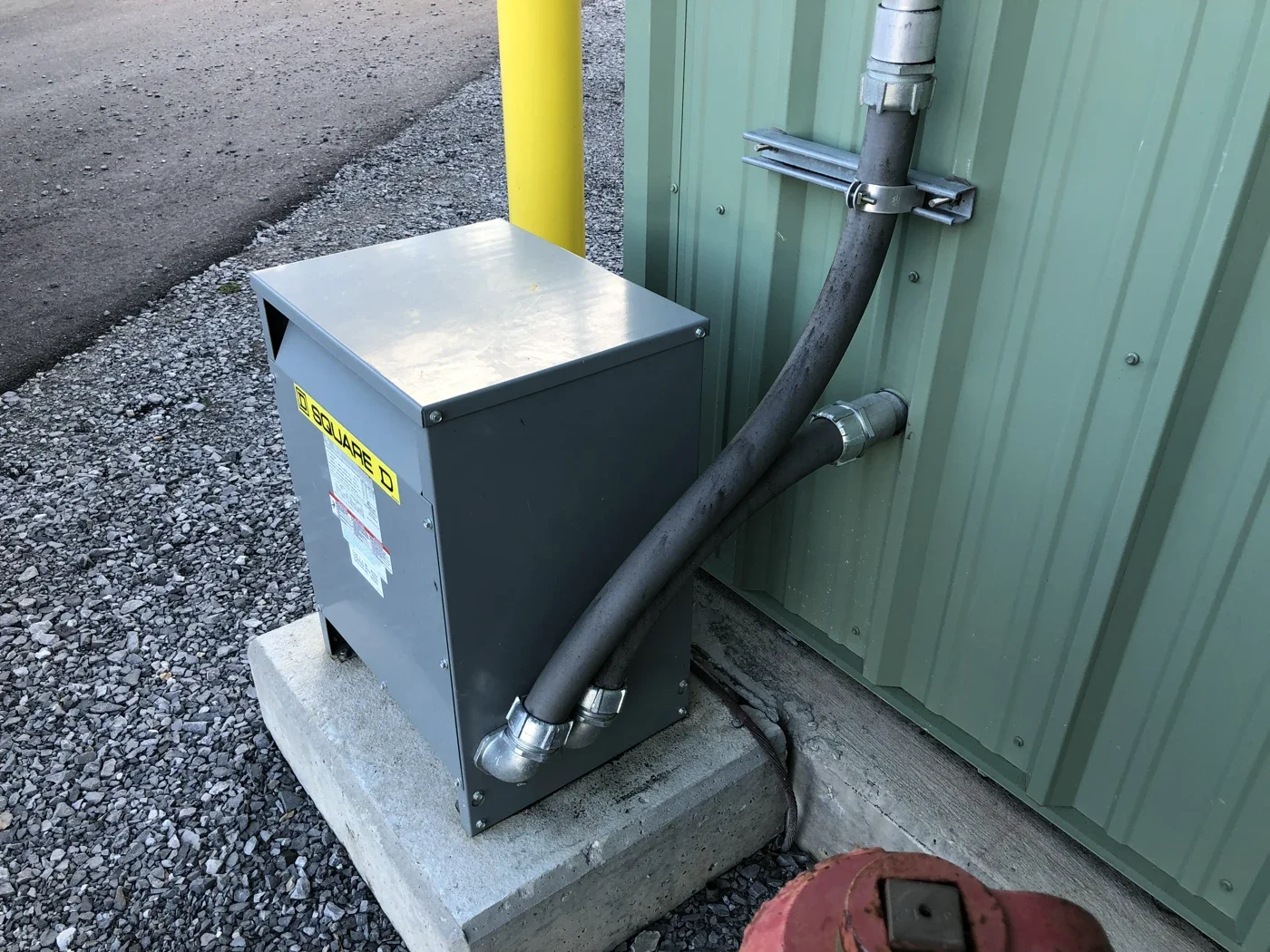 Transformer wired to building.webp