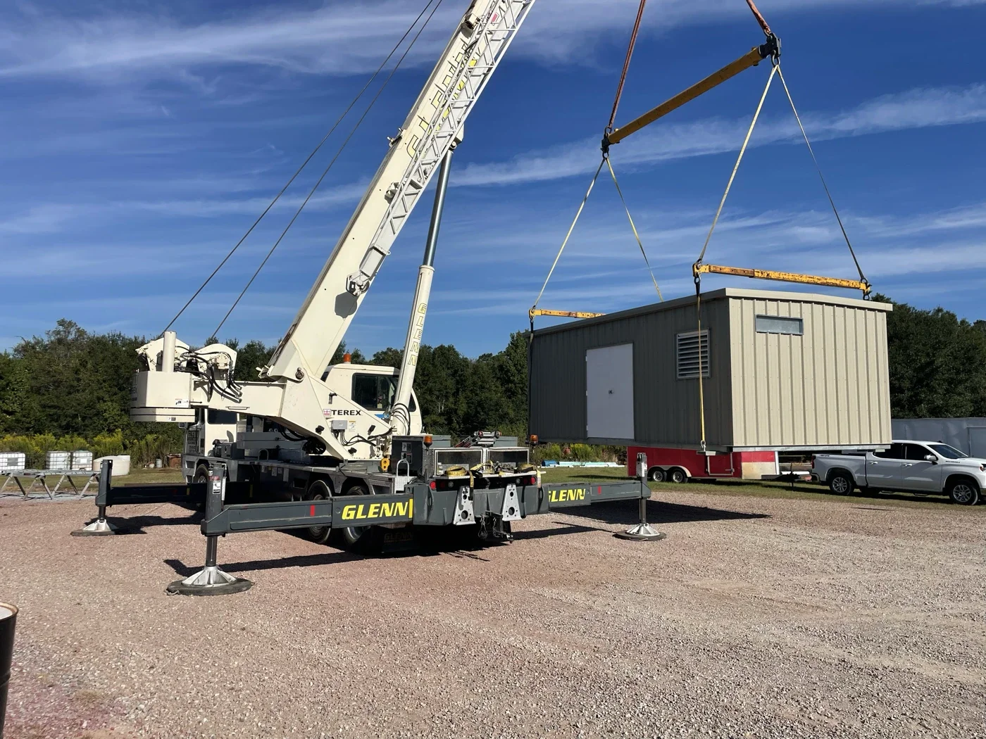 Building being loaded with crane1.webp