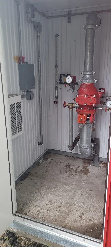 Dry system riser in enclosure.webp