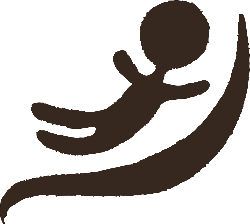 Silhouette of a person running and holding a ball