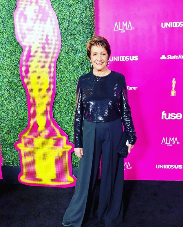 Gregory's client, Actress with short hair at awards ceremony.PNG