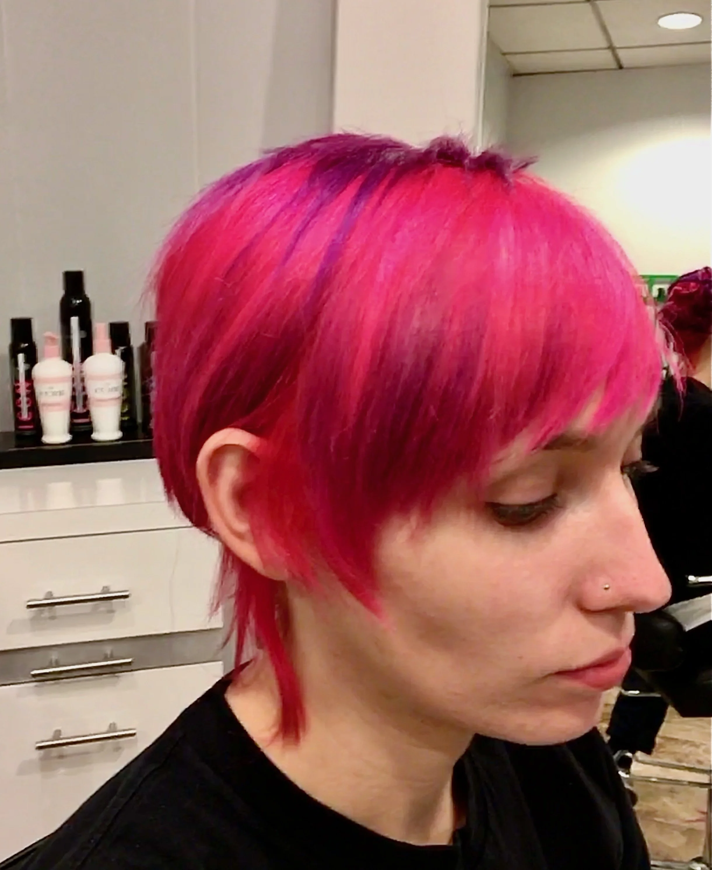 Woman fuscia short mullet.jpeg