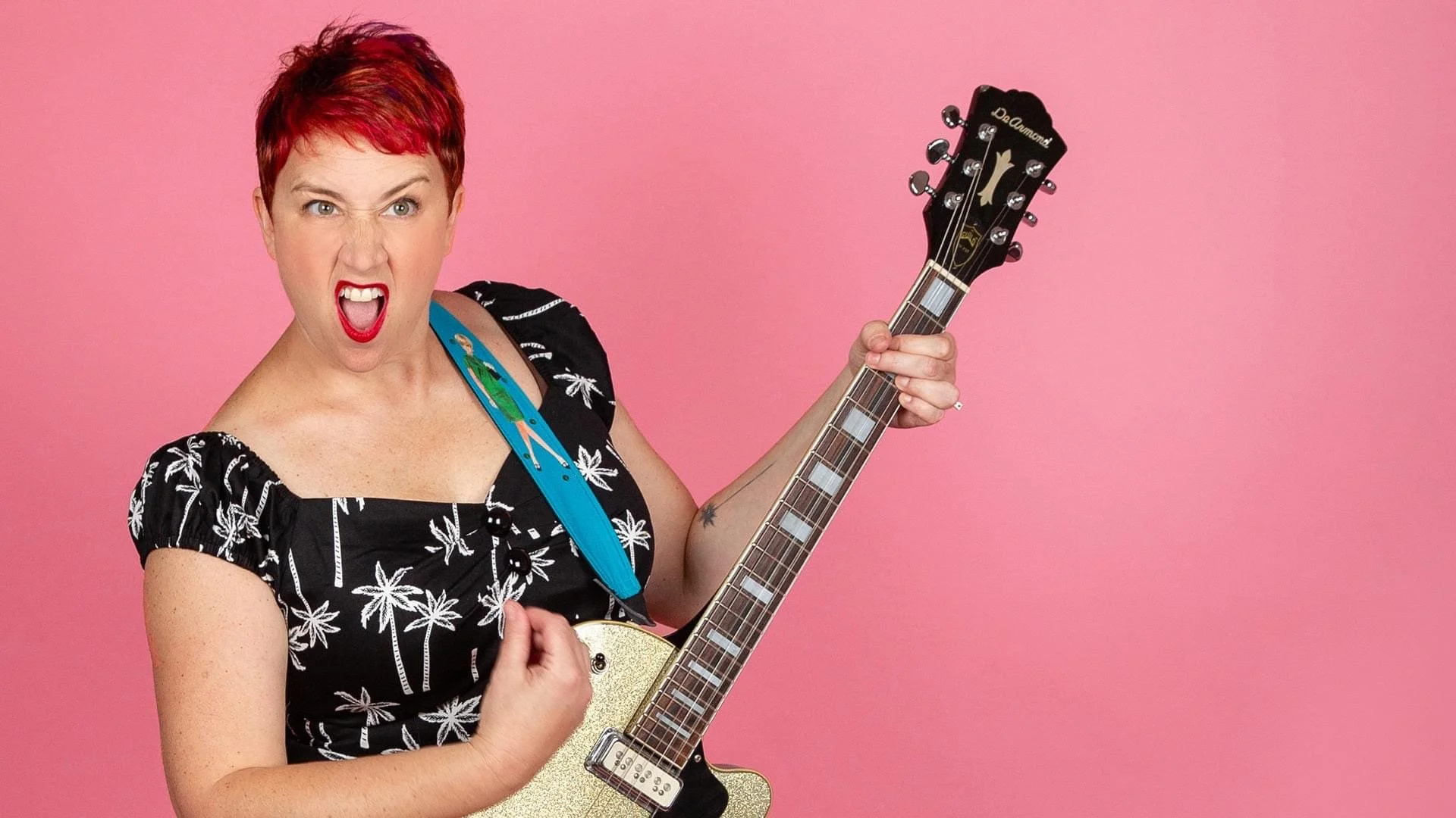 Bright red hair color, pixie cut on rock star for album photo.JPG
