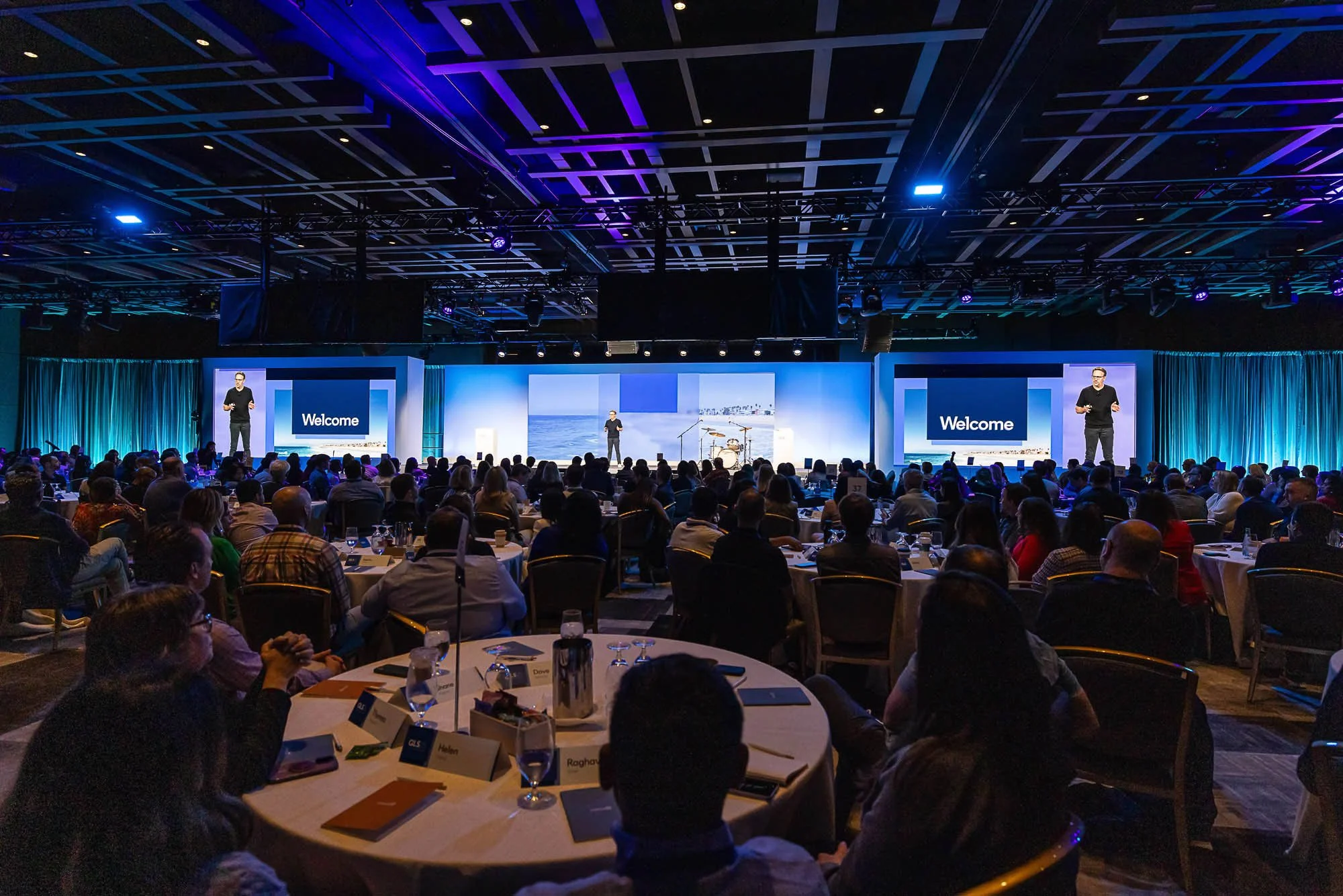 Corporate leadership summit with keynote presentation and large-scale stage production