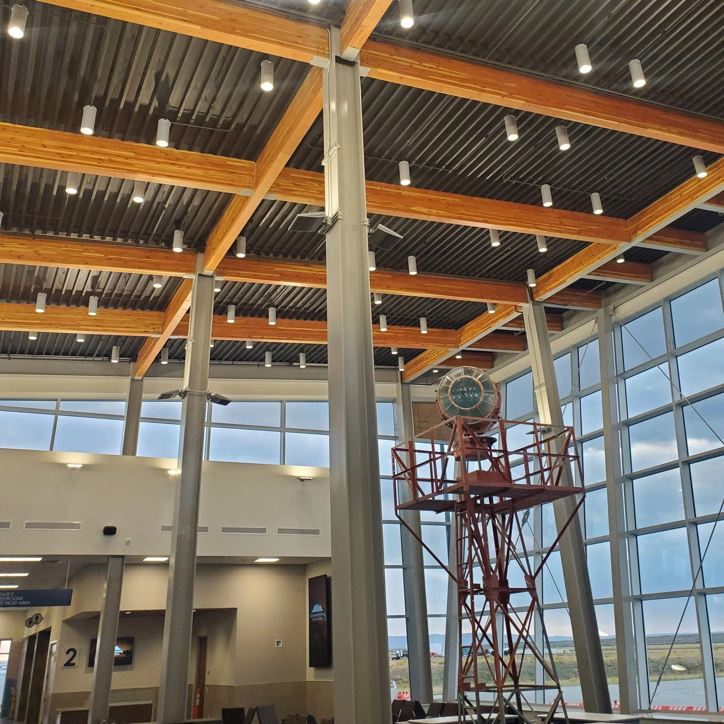Oranssi technician working on a roof project