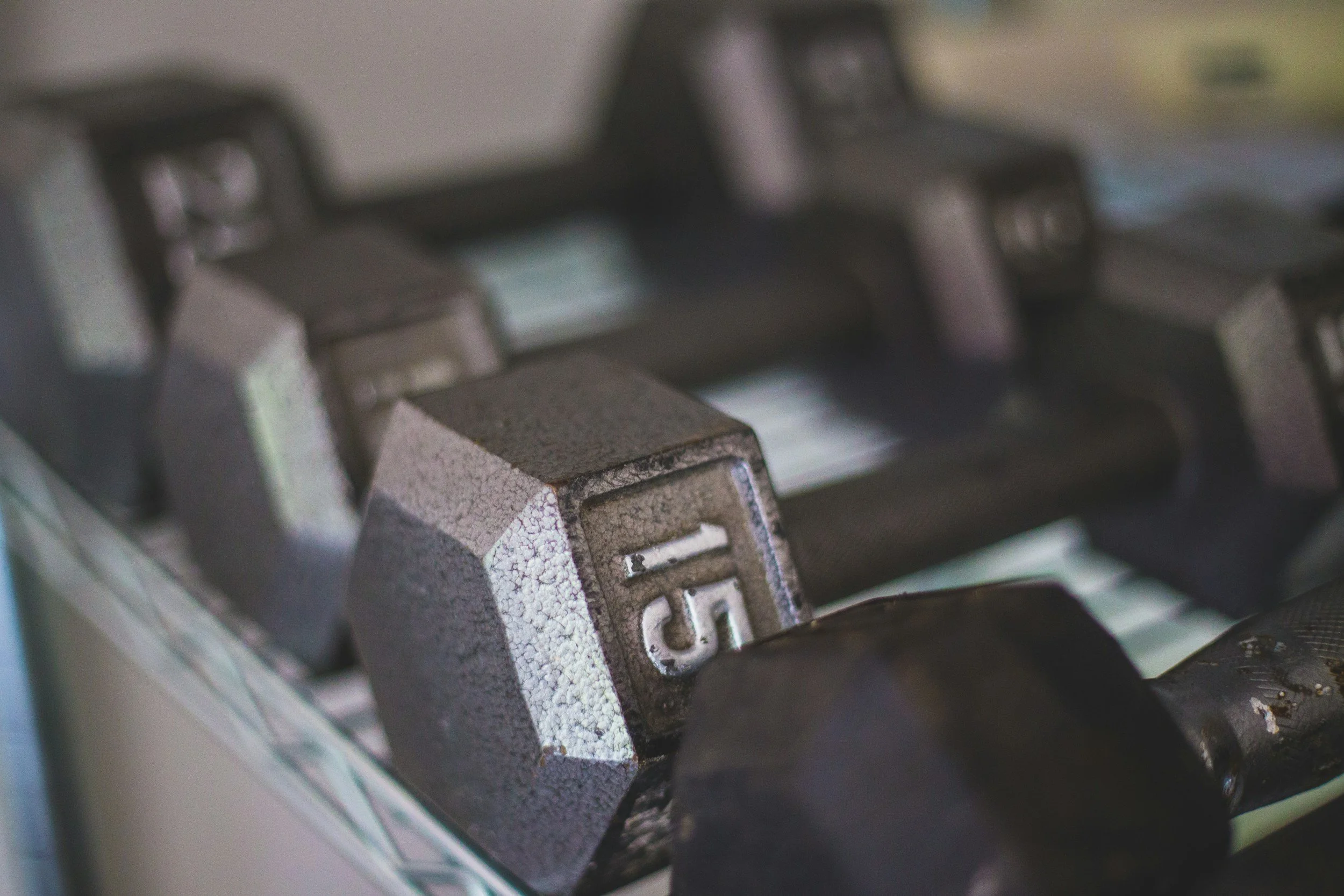 Close-up of a mechanical keyboard key with the letter 'D' on it, showing some wear and dirt.