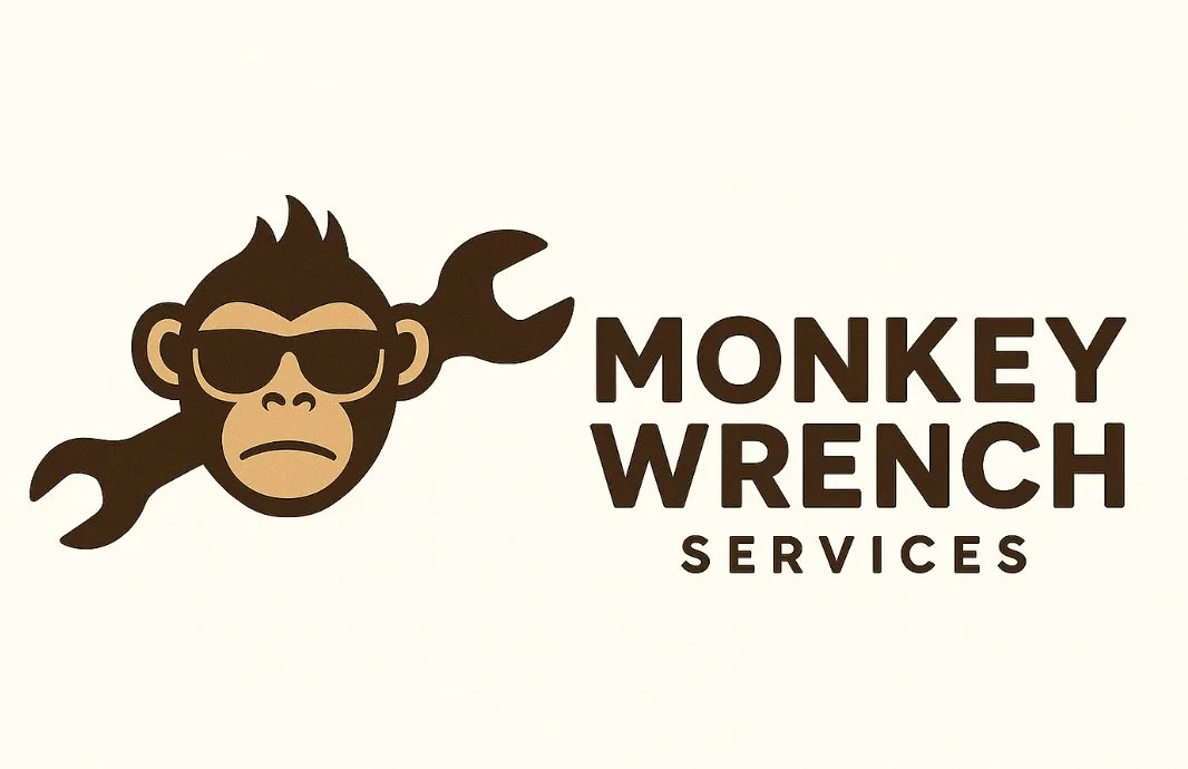 Logo of a cool monkey wearing sunglasses with a wrench, representing Monkey Wrench Services.
