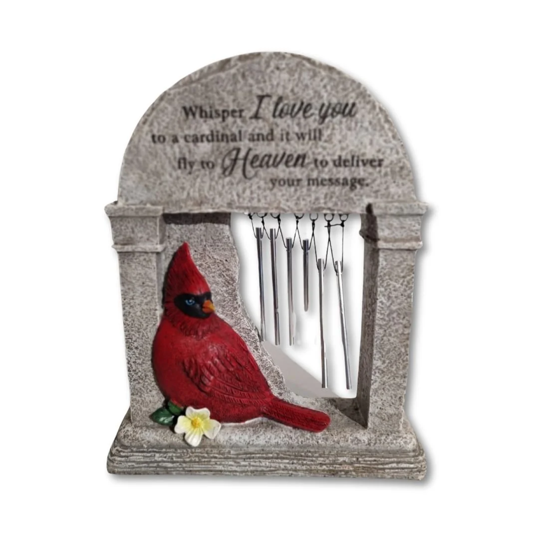 A decorative indoor wall hanging with a cardinal bird, a small white flower, and a hanging set of silver keys. The top of the piece has an inscription that reads, 'Whisper I love you to a cardinal and it will fly to Heaven to deliver your message.'