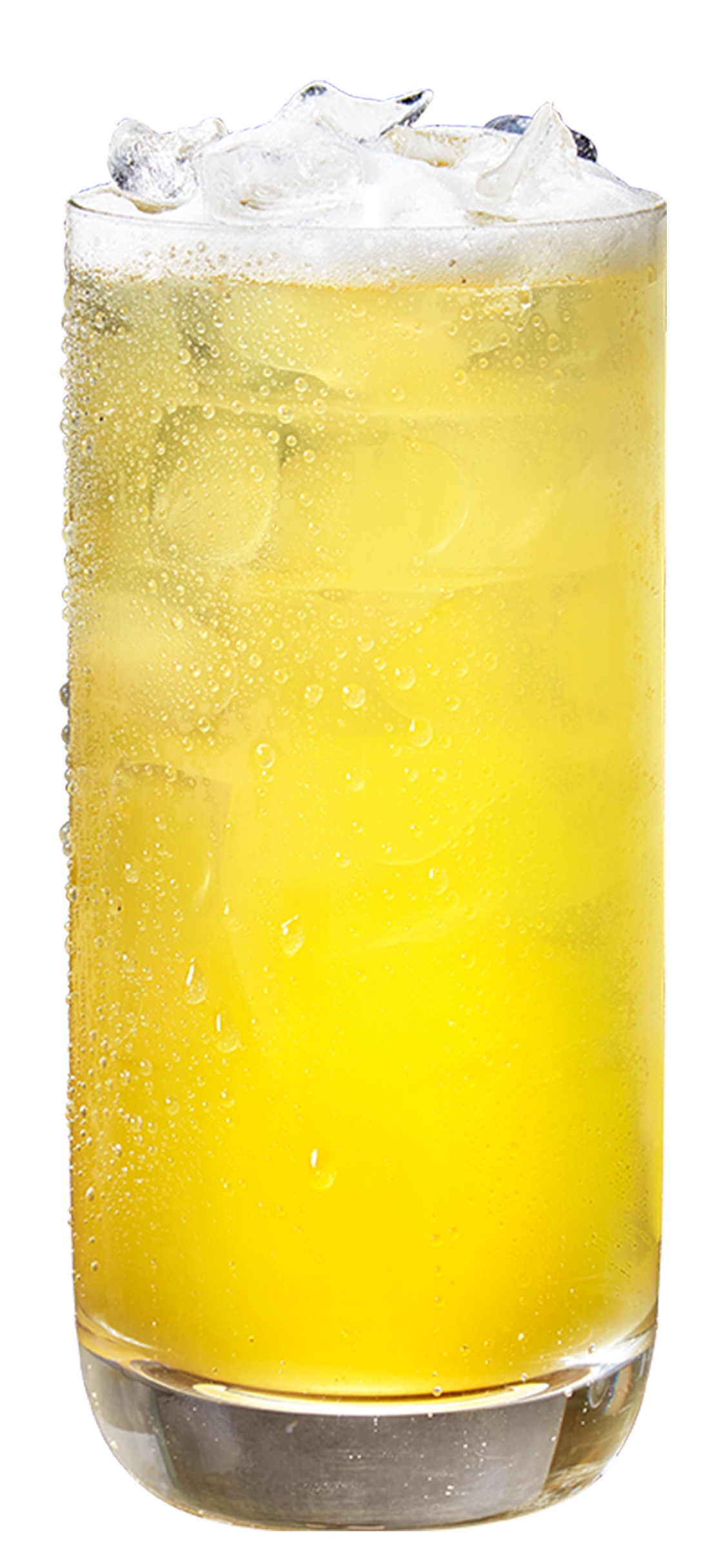 A clear glass filled with a yellow, carbonated beverage topped with ice and foam.