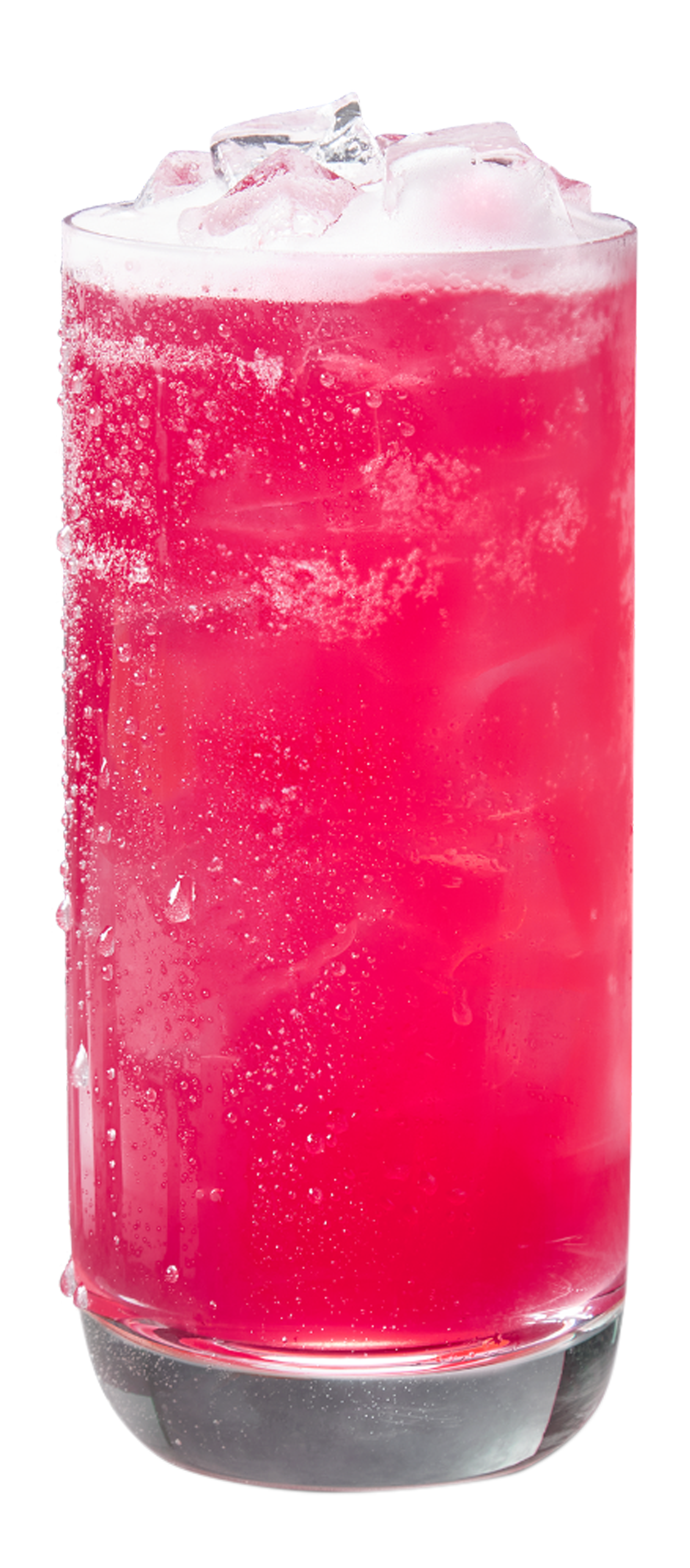 A glass of pink soda with ice cubes and bubbles.