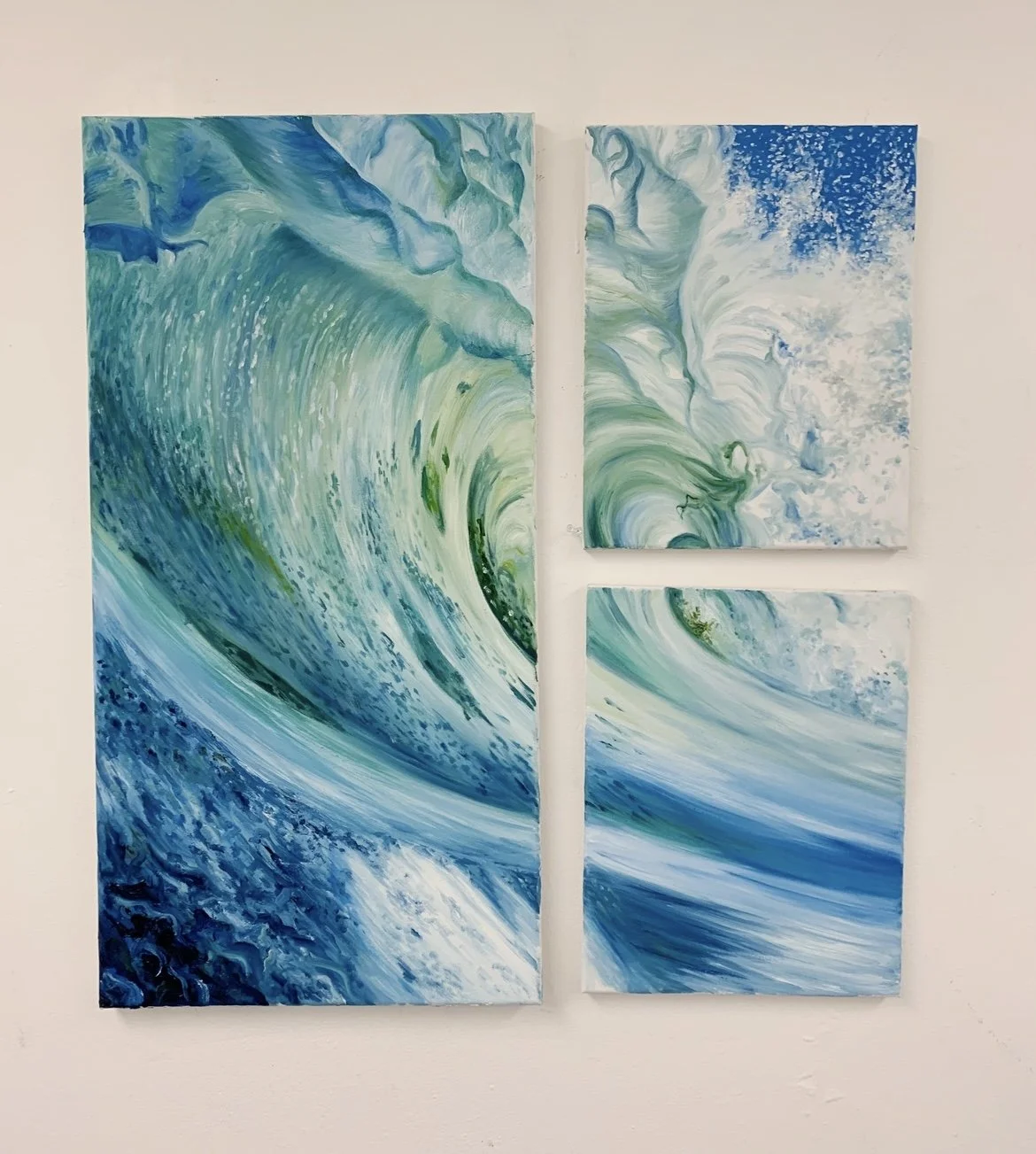 A multi-panel painting depicting ocean waves in shades of blue, green, and white.