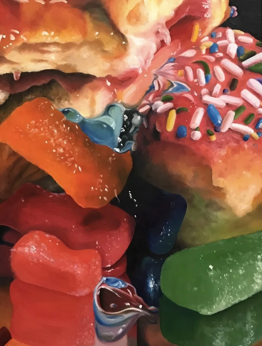 Close-up of colorful candies including gummy bears, sprinkles-covered donut, and jelly beans.