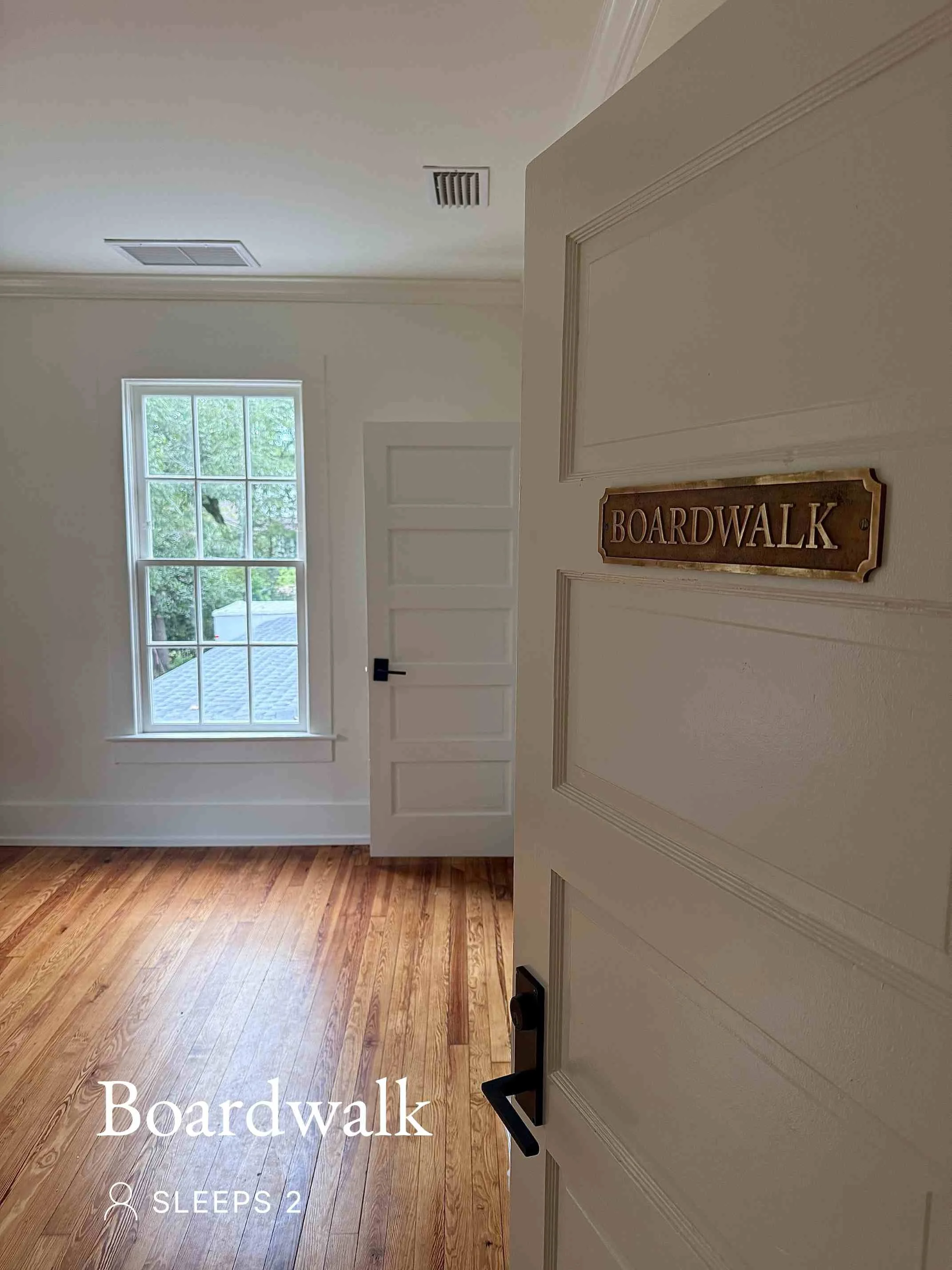 Door to the room of a boutique hotel in Fairhope, Alabama