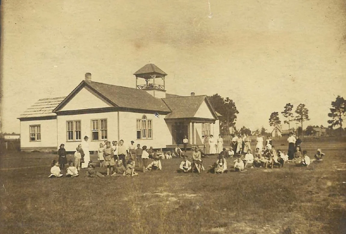 An antique photo of the Bell Building