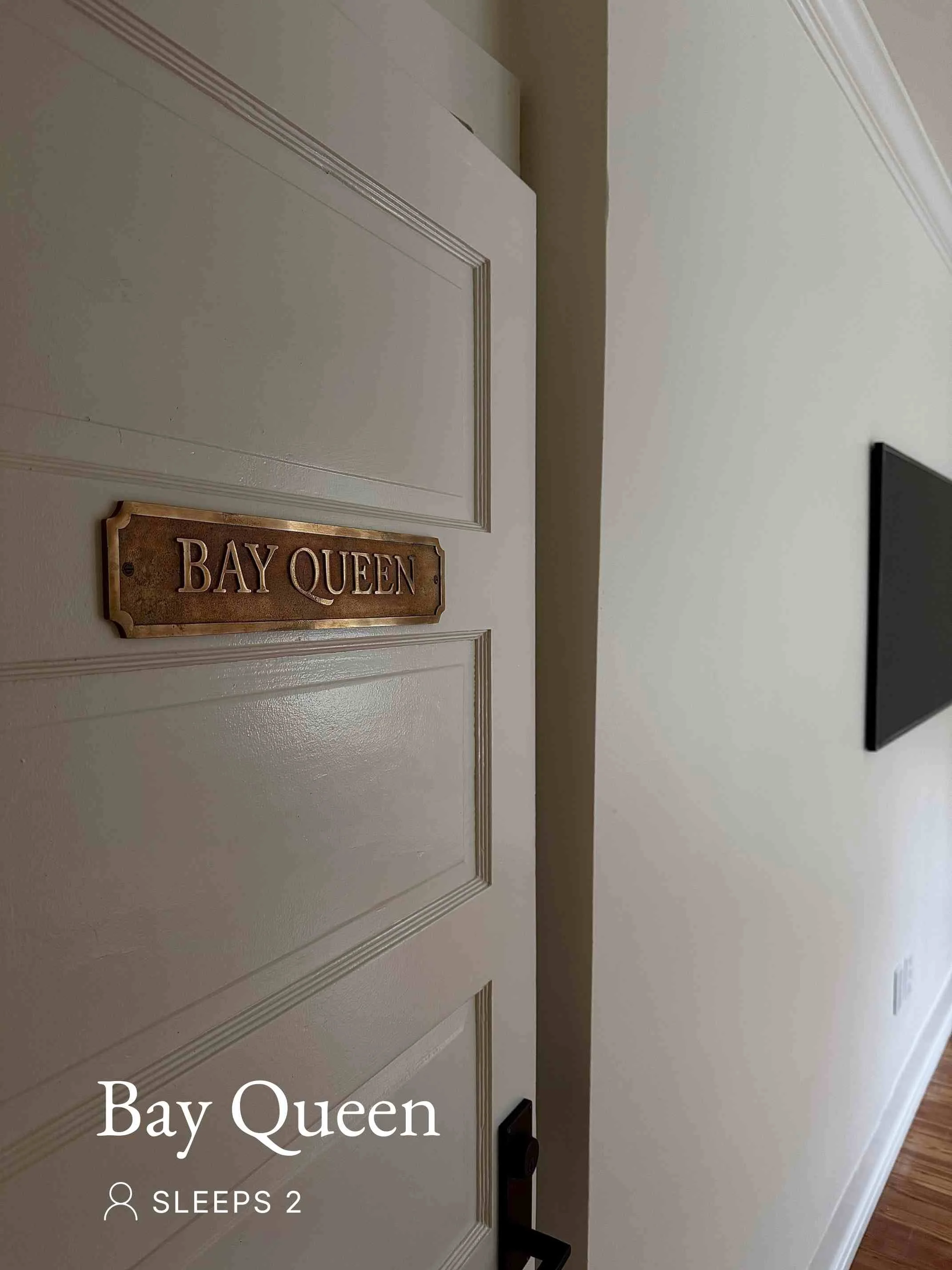 Bay Queen room door in the boutique hotel in Fairhope, Alabama