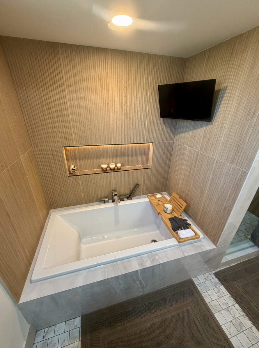 Complete tub remodel to a personal spa with custom lighted niche