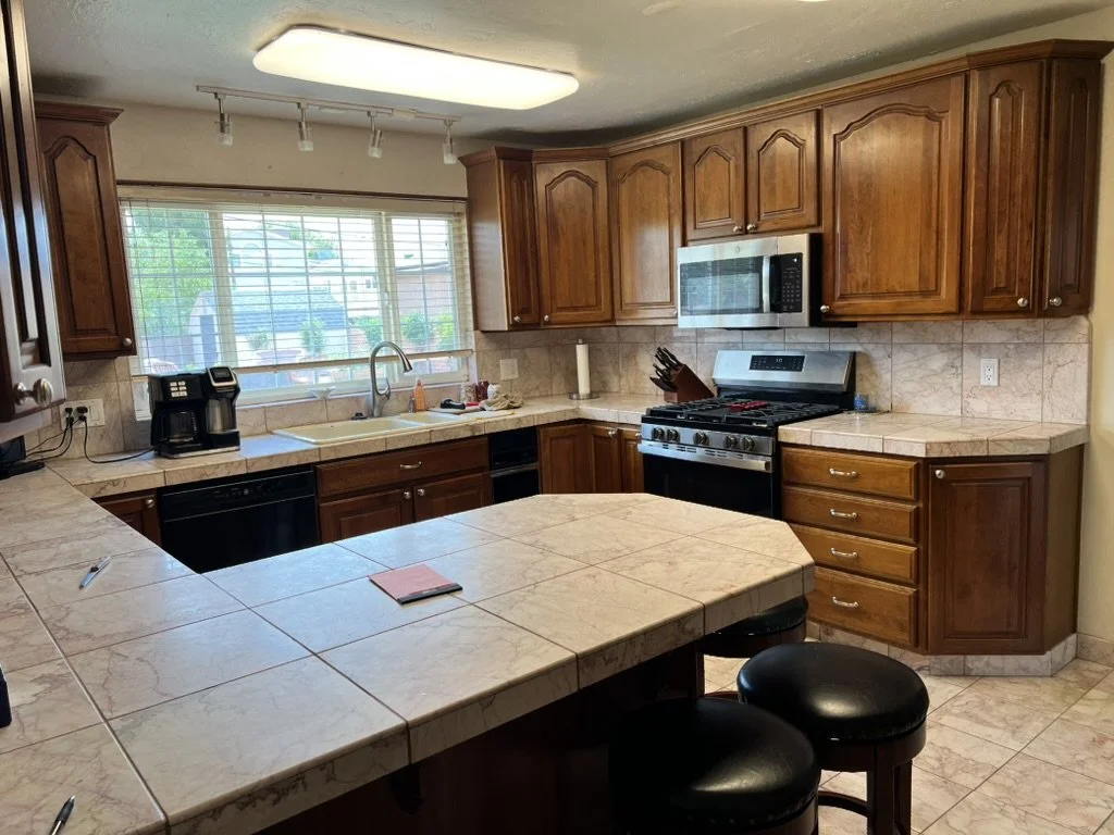 Dated kitchen, the owner wanted an open kitchen and dining concept. 