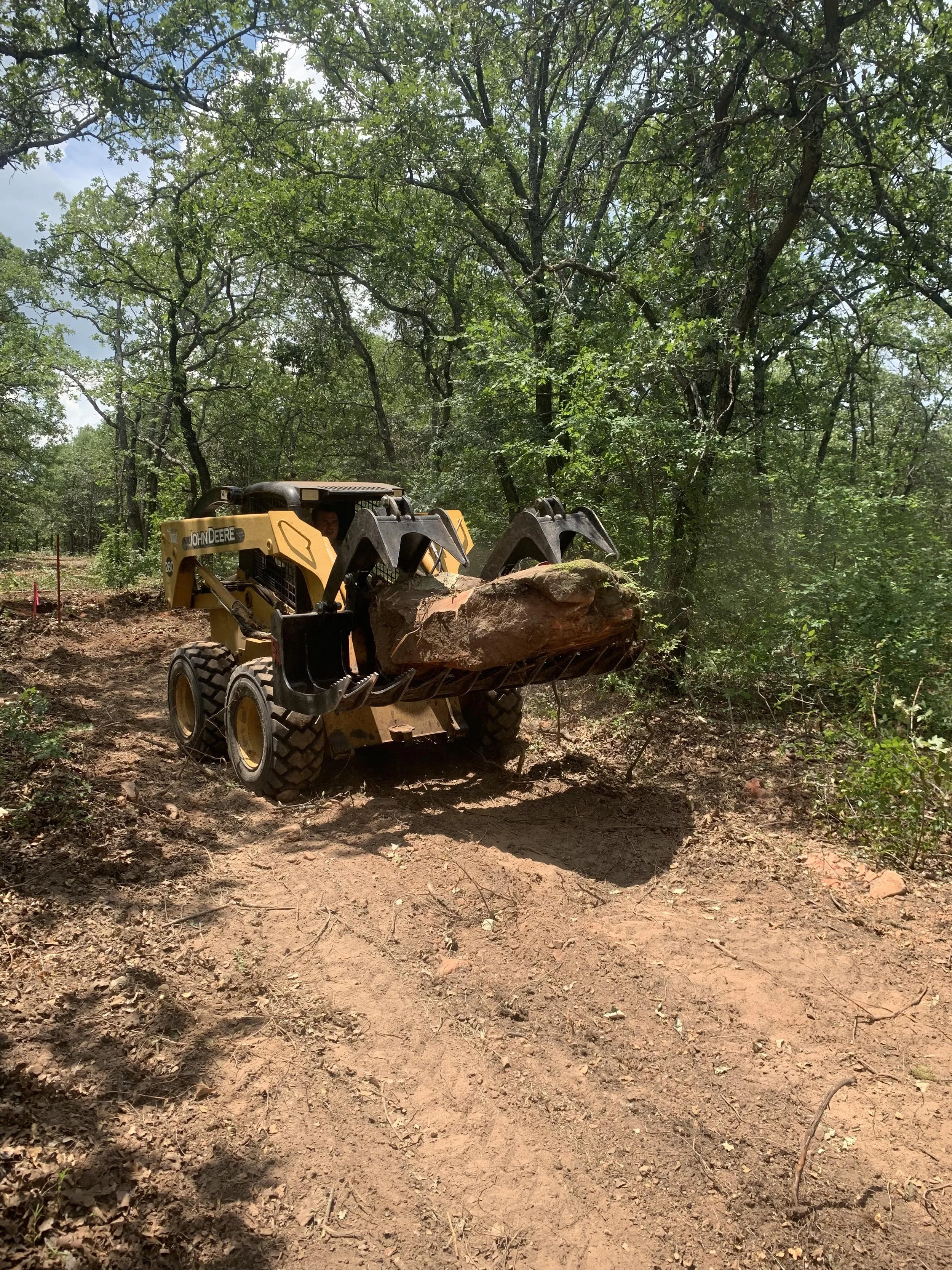 Westie enterprises moves big boulders.