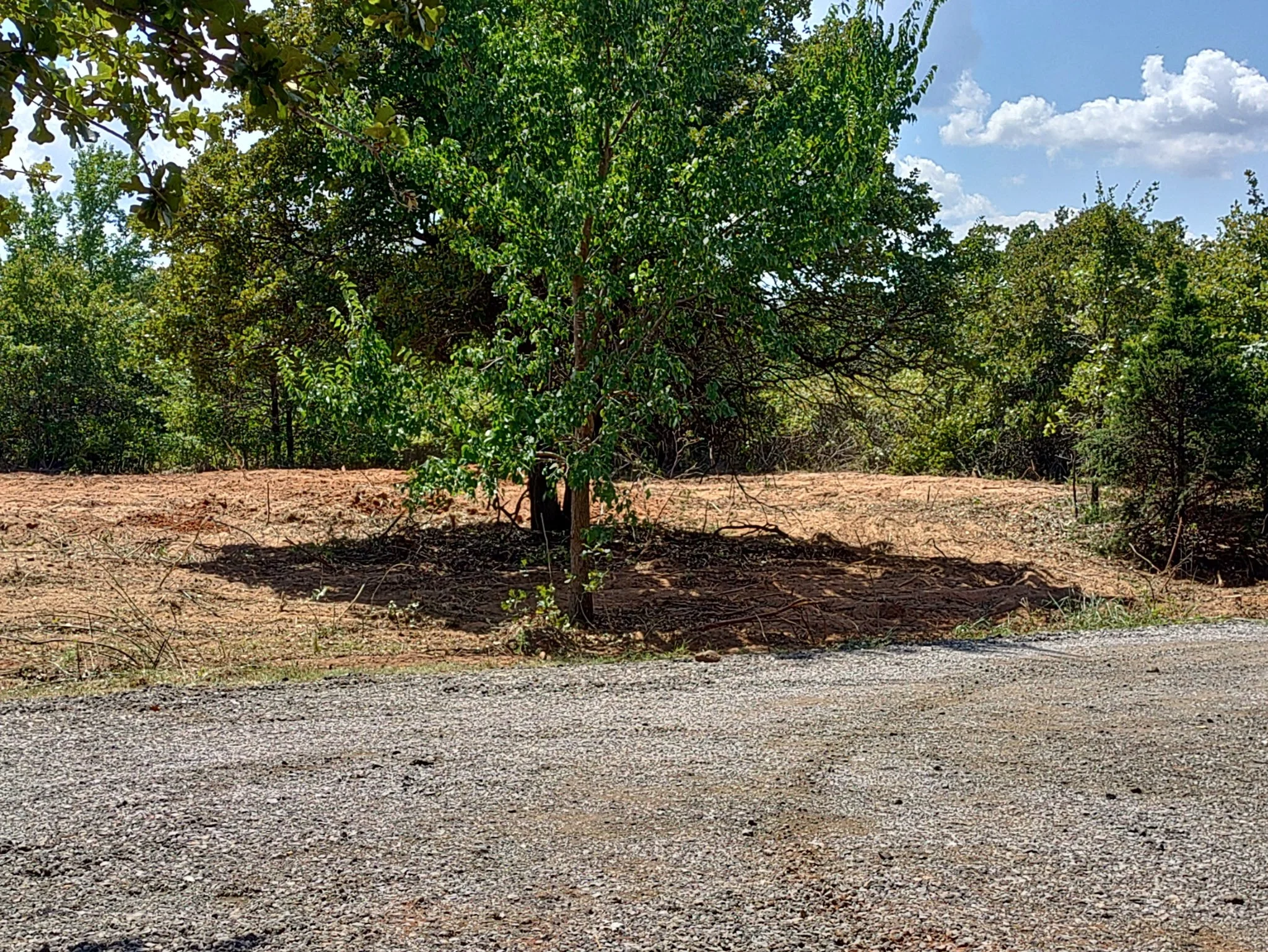 During Photo of a clearing / Building pad in Luther, Oklahoma 