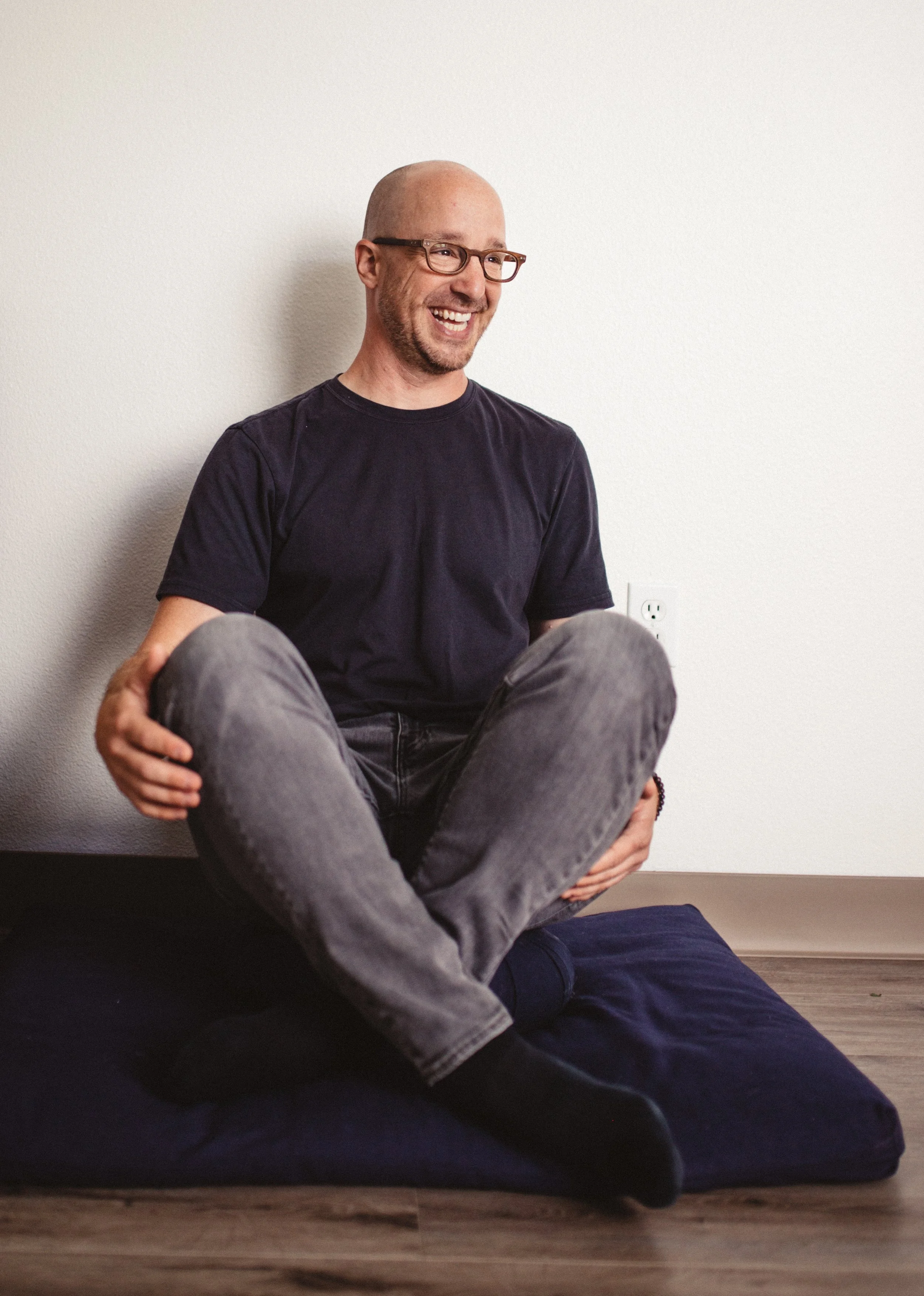 Christopher Miller acupuncturist in Miller Acupuncture clinic treatment room in NW 17th Avenue, Portland Oregon