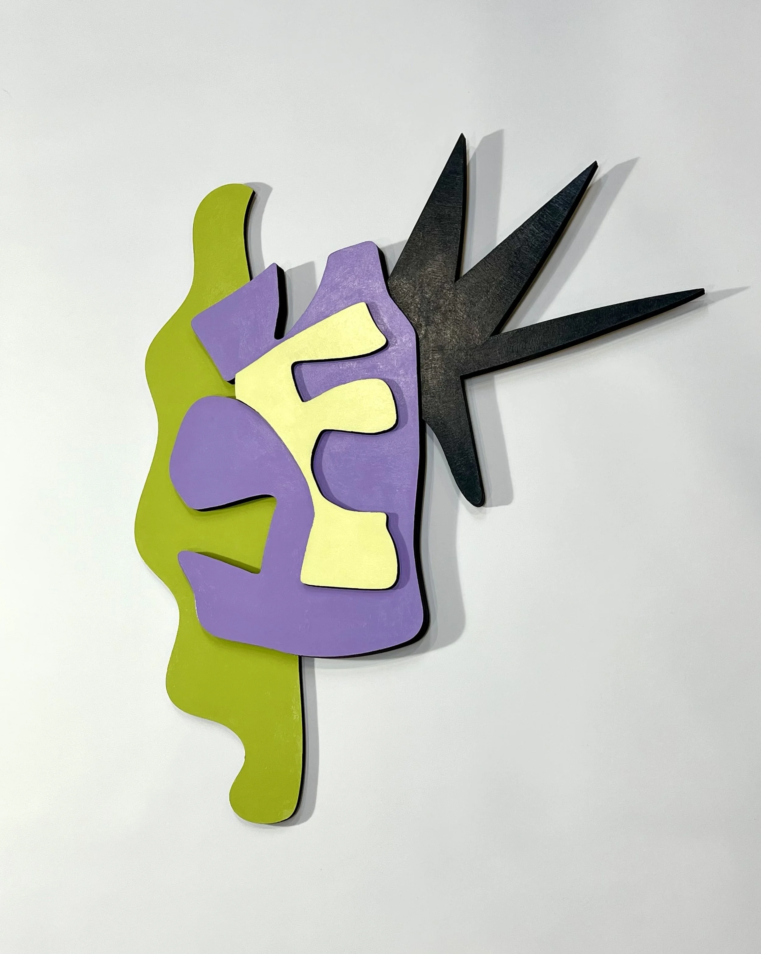 Colorful abstract wall art with a green, purple, yellow, and black design.