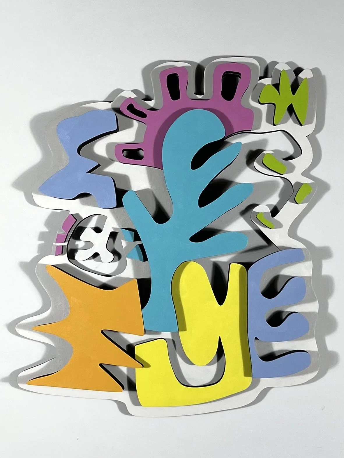 Colorful abstract art with various shapes, including a blue hand, a yellow sun, purple and green accents, and black outlines, arranged over a white background.