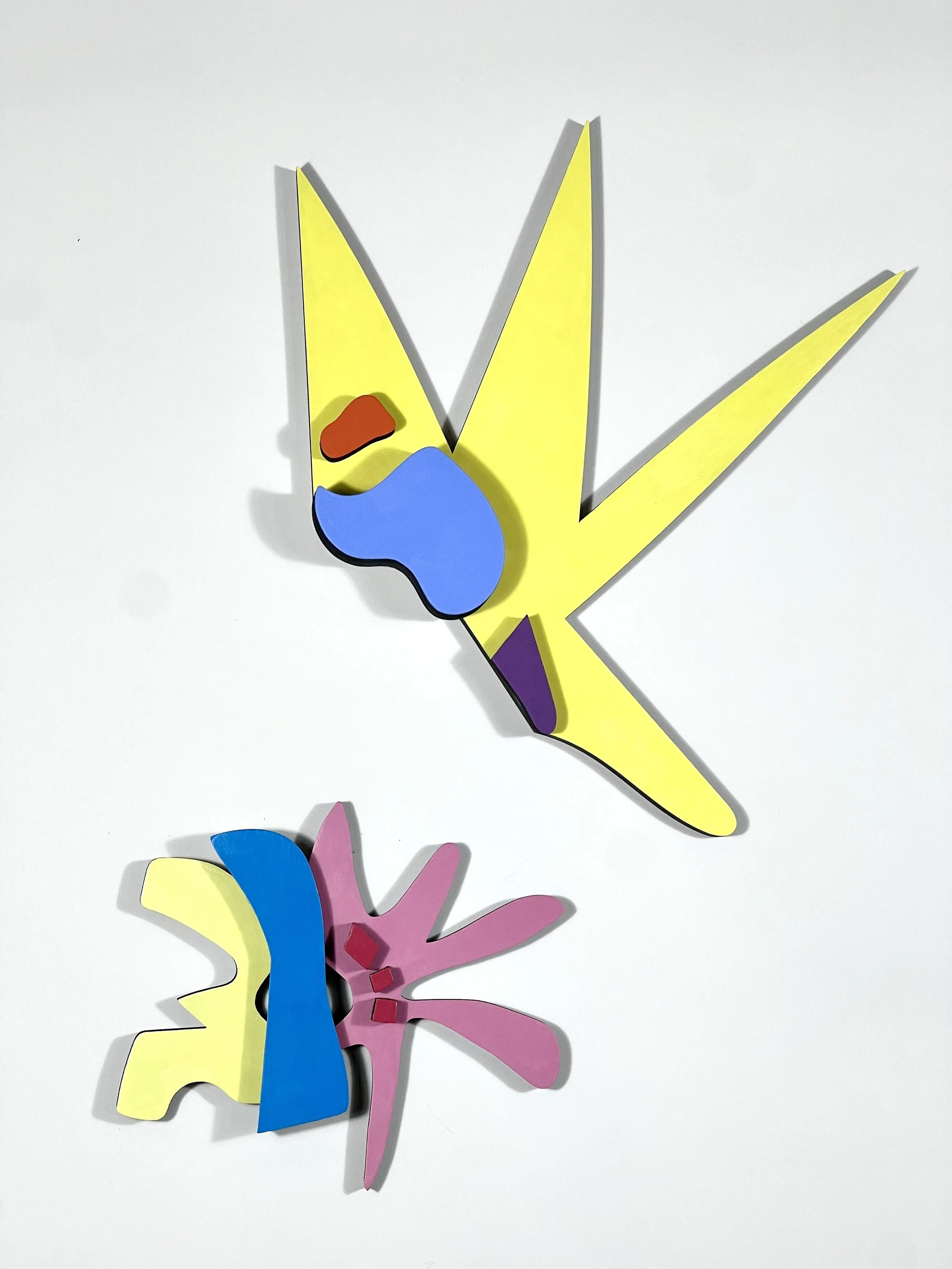 Colorful abstract art pieces on a white background, including yellow, blue, purple, pink, red, and black elements.