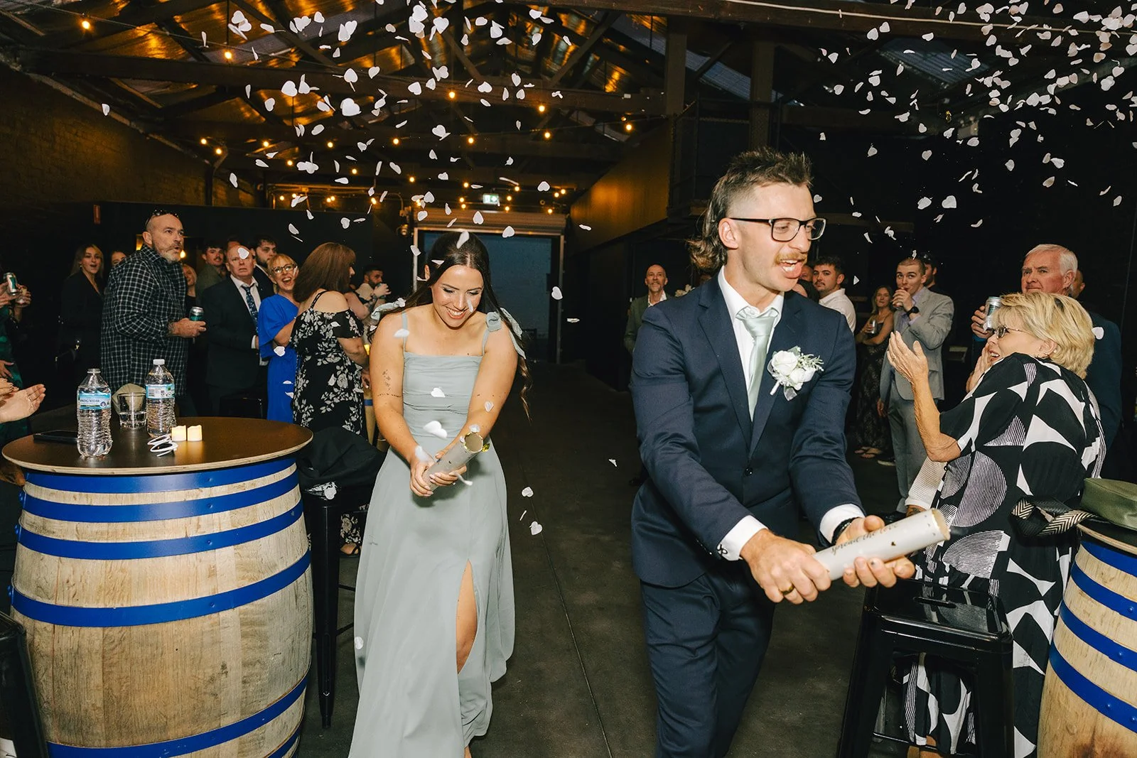 Wedding party entrance with confetti at Warehouse 16, Adelaide CBD