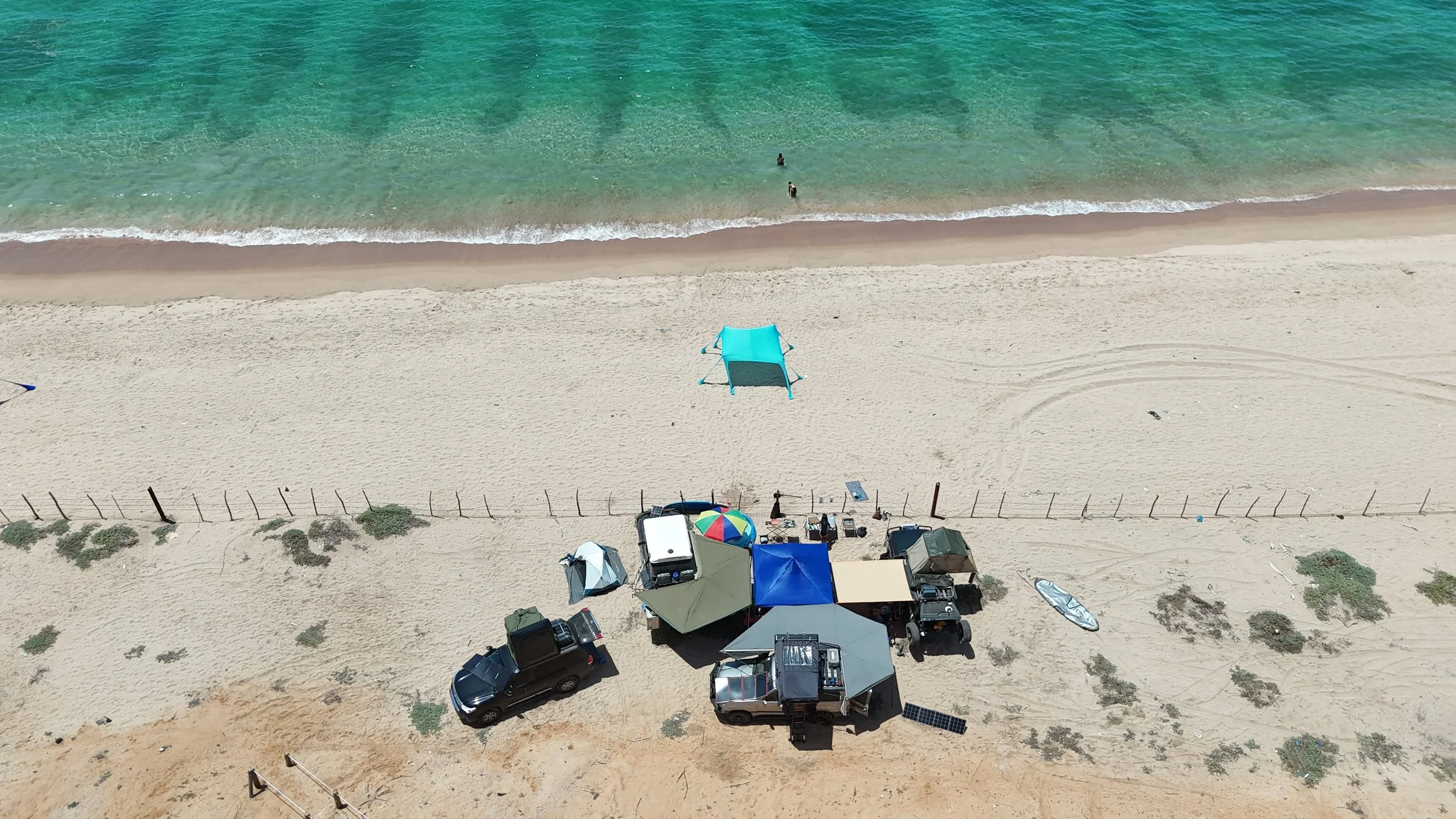 Drone shot of a camping experience in Namibe, Angola