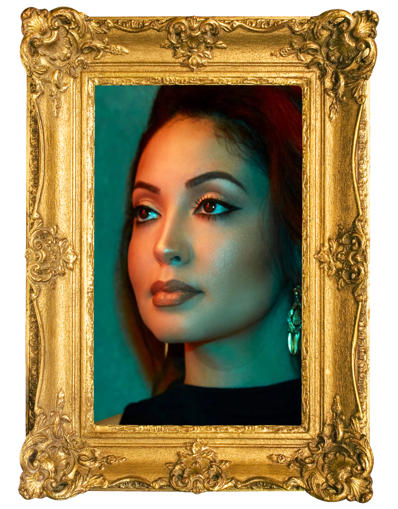 Portrait of a woman with makeup, red lipstick, and earrings, framed in an ornate gold picture frame.