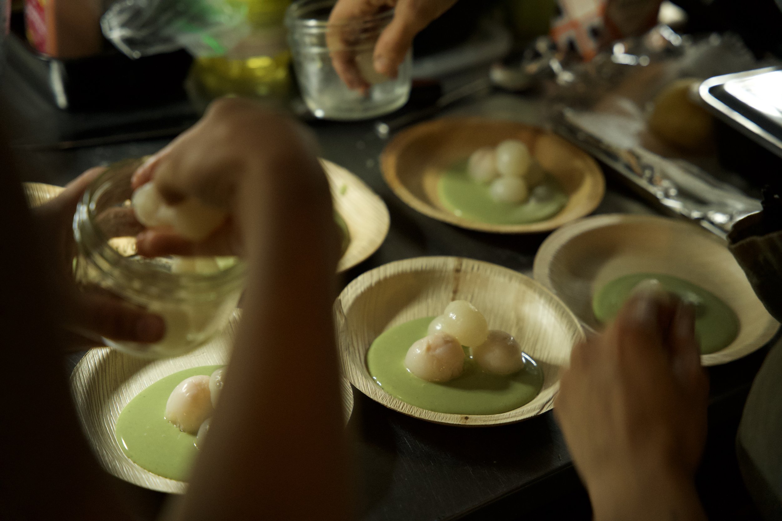 The pandan custard dessert topped with fresh rambutan and toasted coconut flakes. A flavor-explosive experience using ingredients from Vietnam and Venezuela.