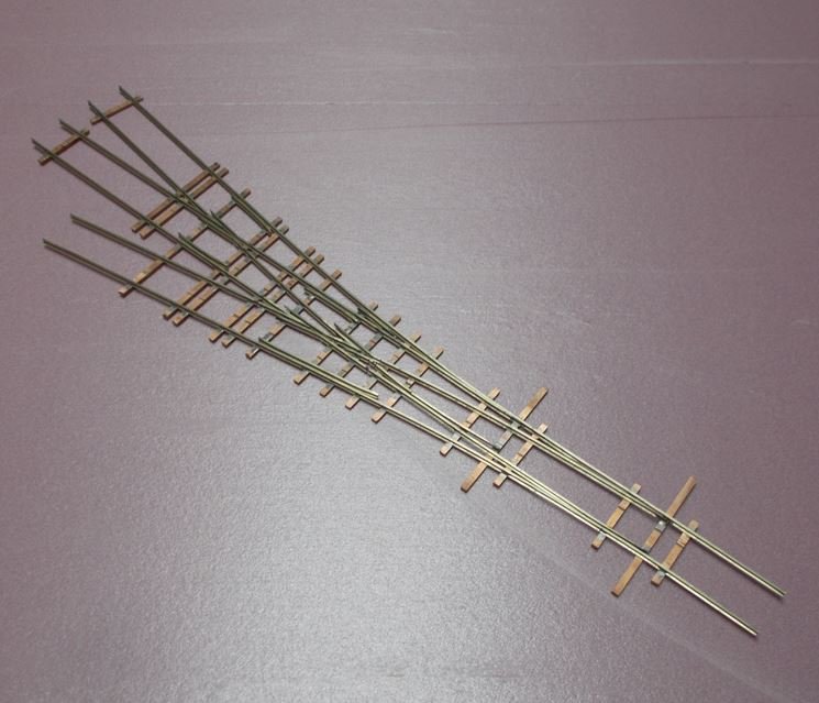 Code-55 3-way turnout (skeleton)