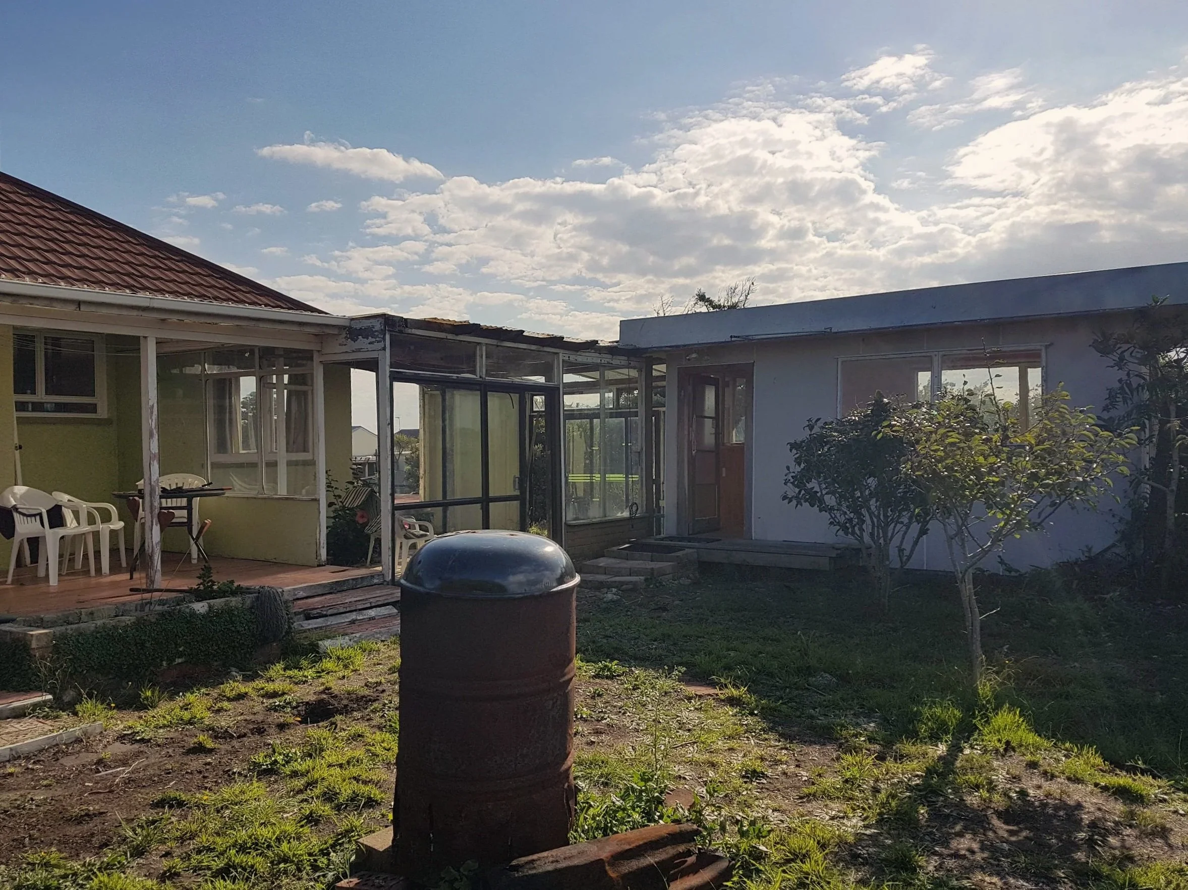 back+of+house+with+hut.jpg