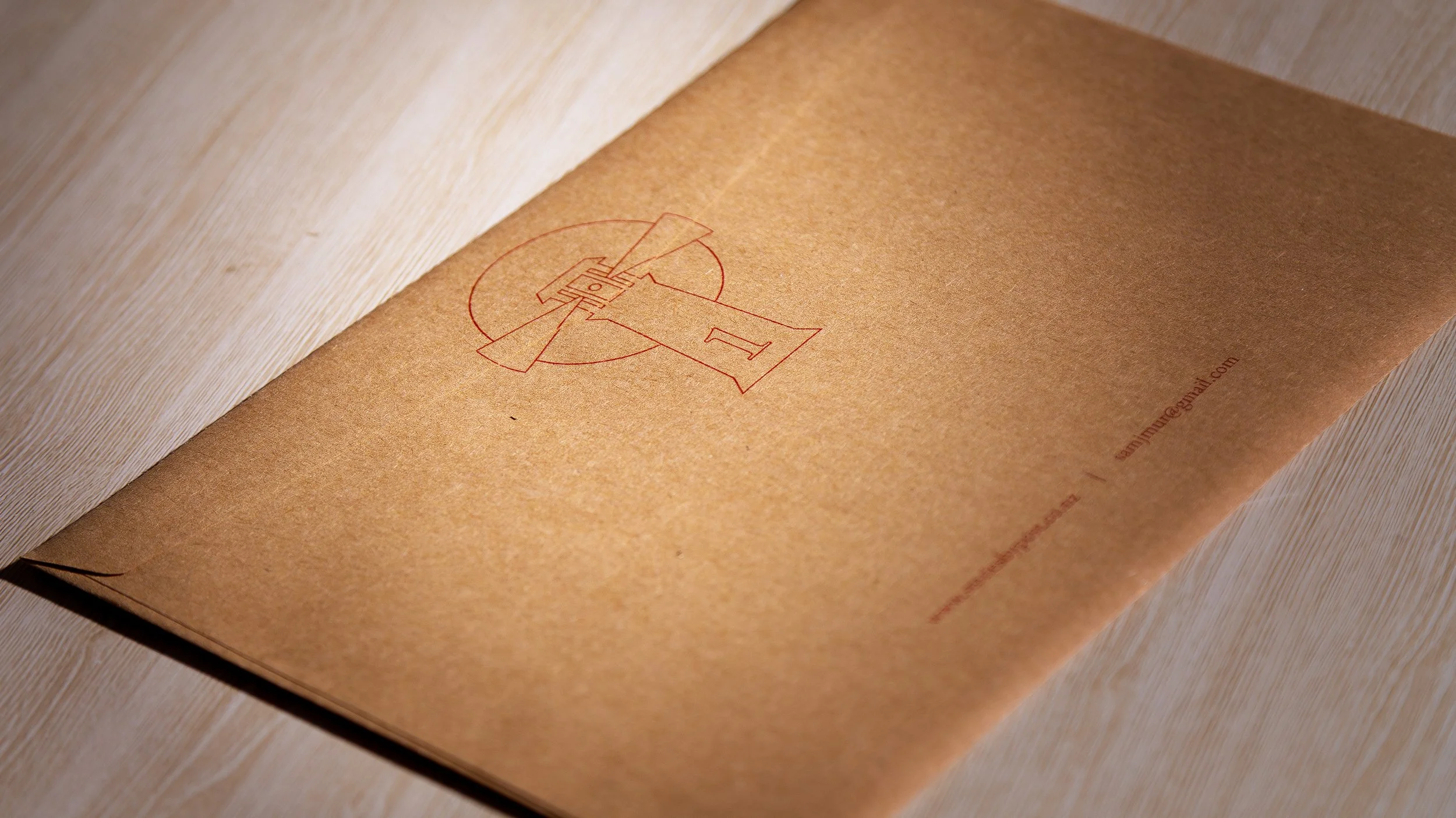 A chapter pack in a brown envelope with mysterious lighthouse icon. This is what's delivered as part of a subscription